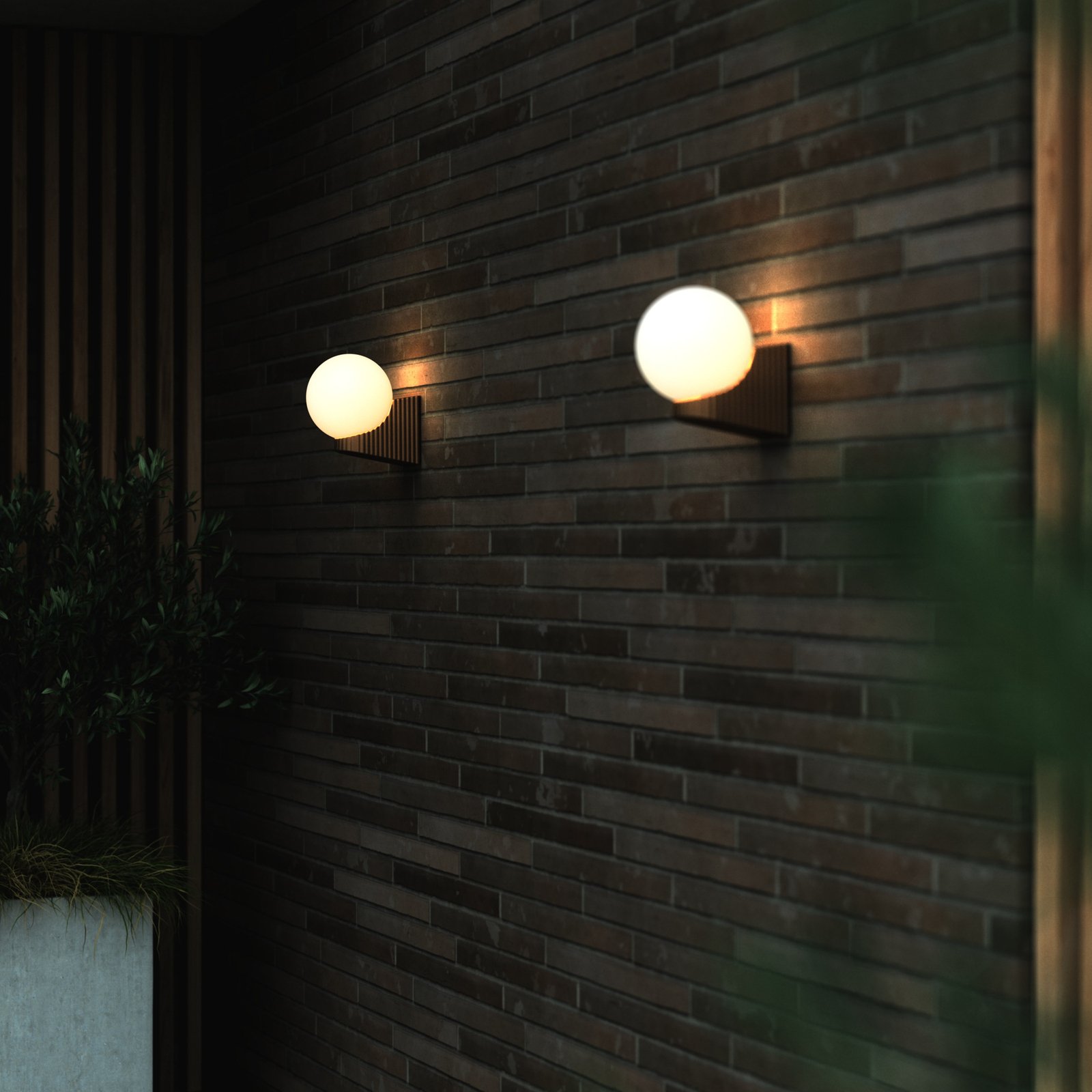 Hayley outdoor wall light with a glass globe brown