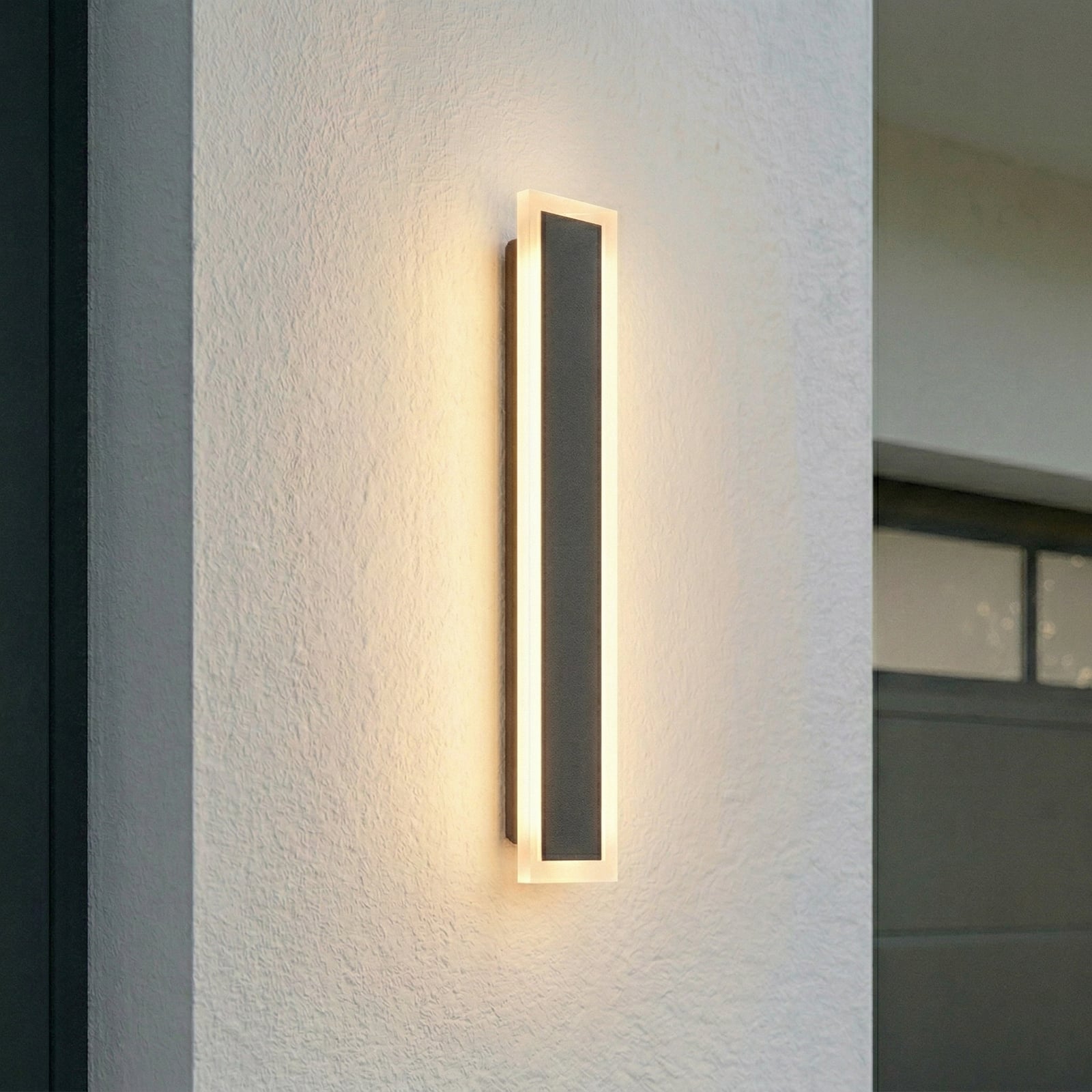 Ilora LED vanjska zidna svjetiljka, CCT, IP65, crna, visina 60 cm, metal -