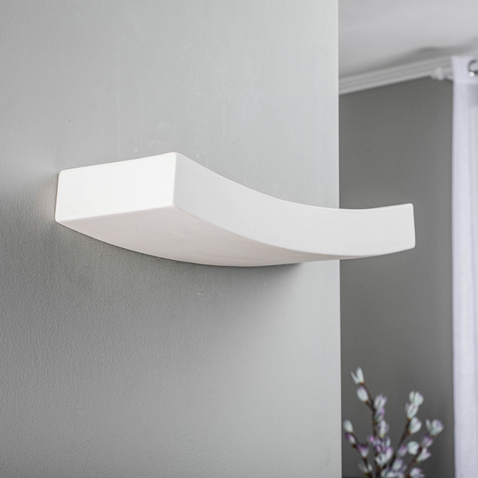 Lino wall lamp made of ceramics, curved shape