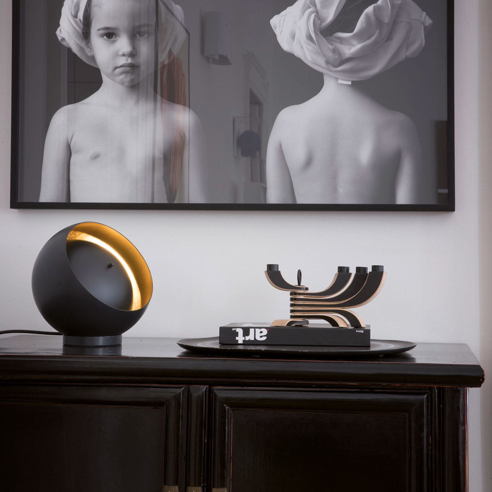 Oluce Eva LED table lamp in spherical shape black