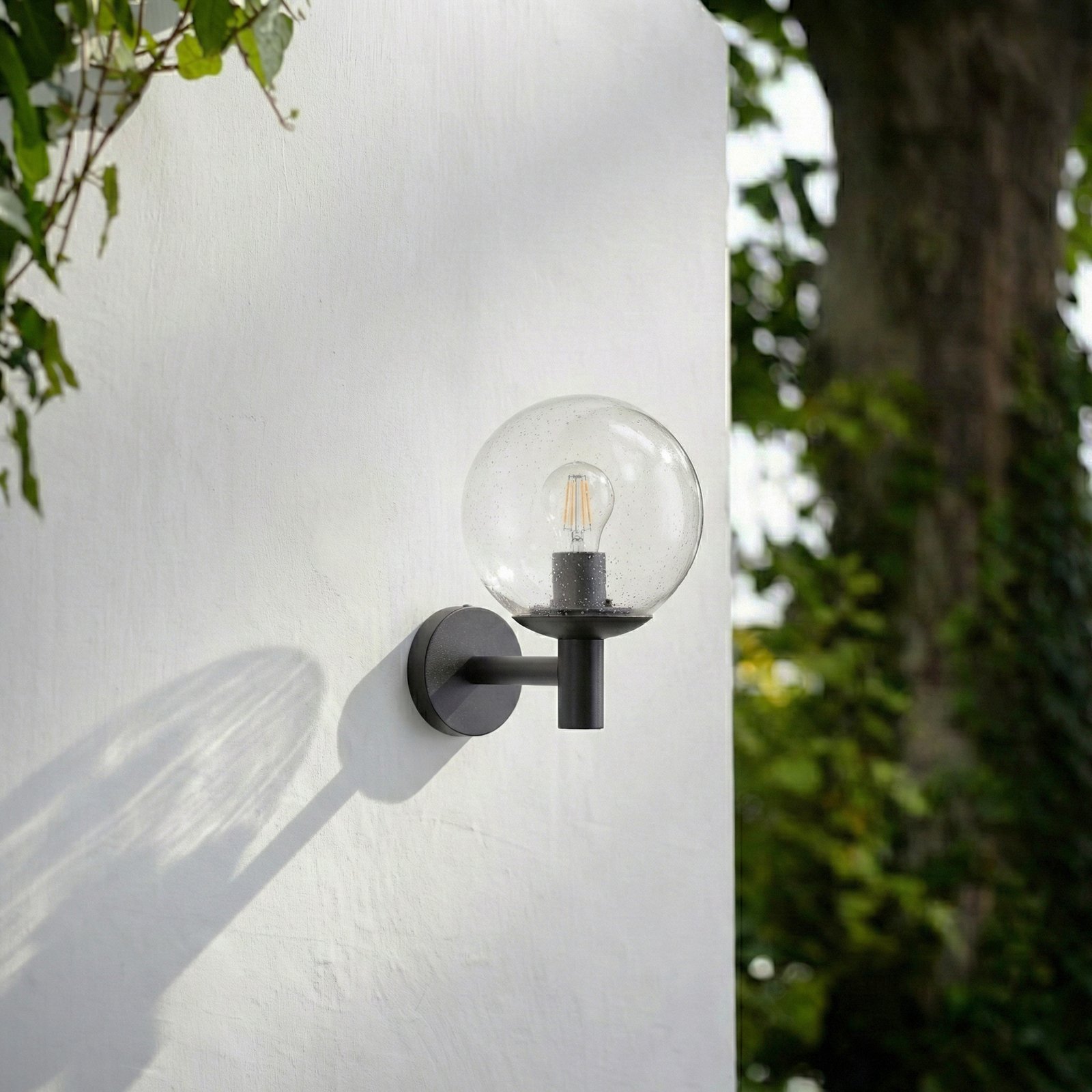 Dangan outdoor wall light Ø 20 cm clear glass - Lindby Dangan outdoor wall light Ø 20 cm clear glass - Lindby