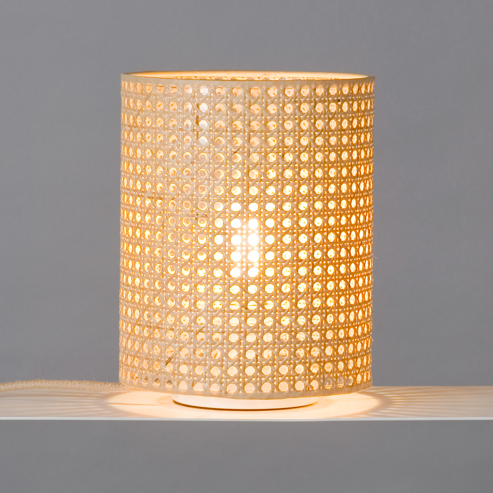 Wiener table lamp with a woven rattan shade