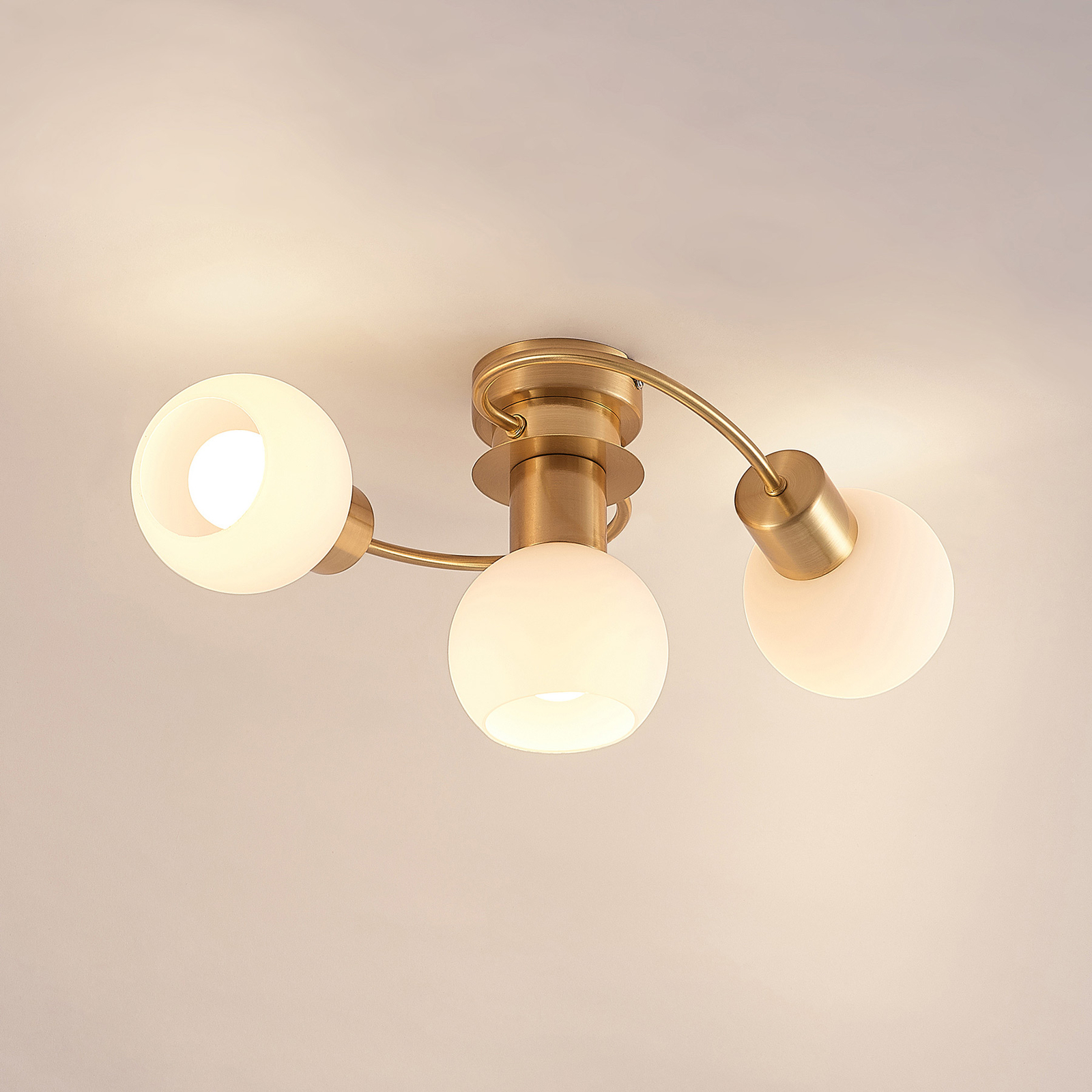 Lindby Ciala ceiling light, 3-bulb, brass-coloured, glass