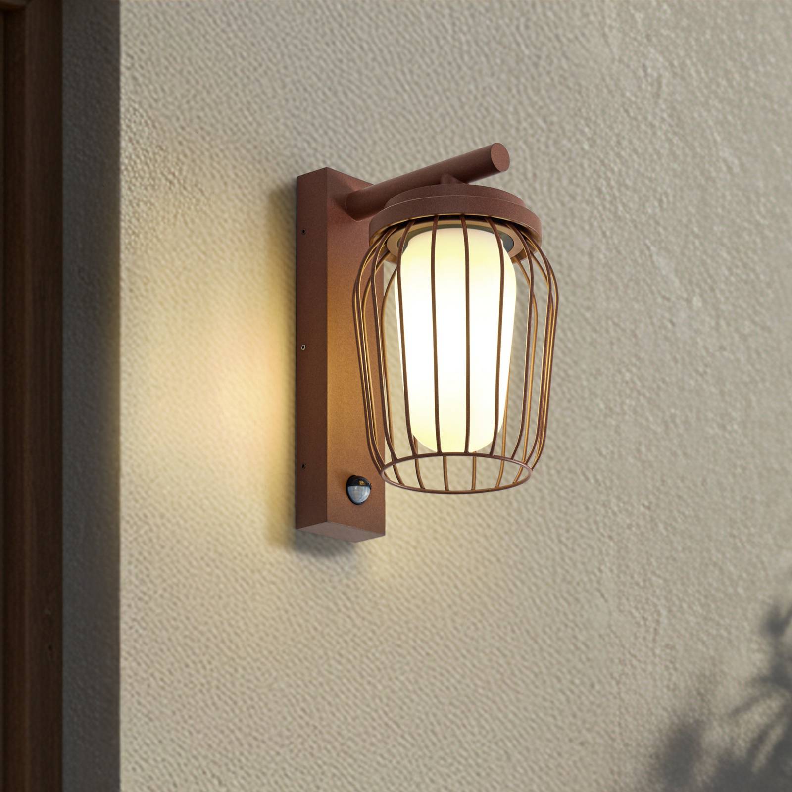 Lucande Außenwandleuchte Chandan, rost, Sensor, IP44, E27 günstig online kaufen