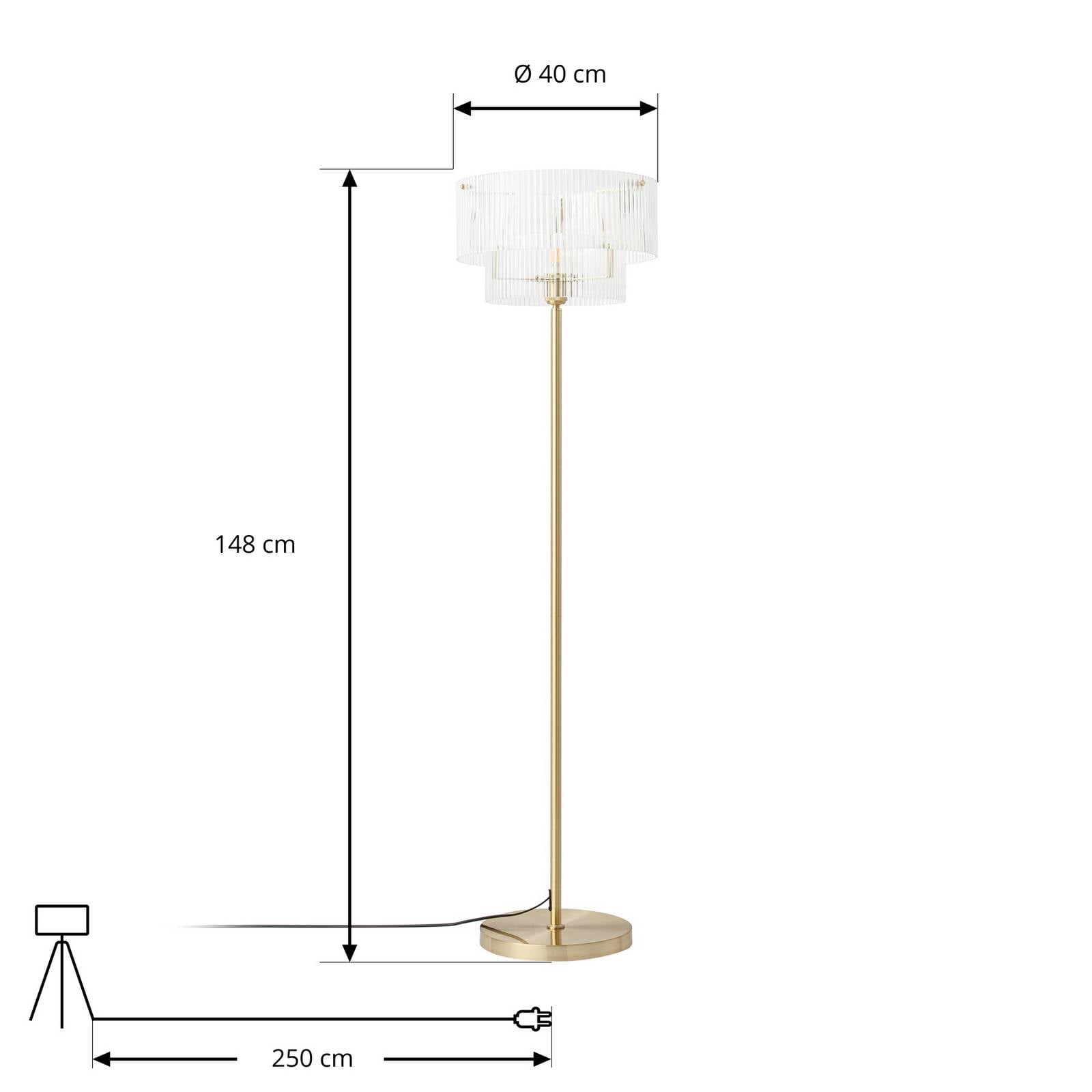 Lampa stojąca Lucande Meritt, mosiądz/przezroczyste szkło, wysokość 160 cm,