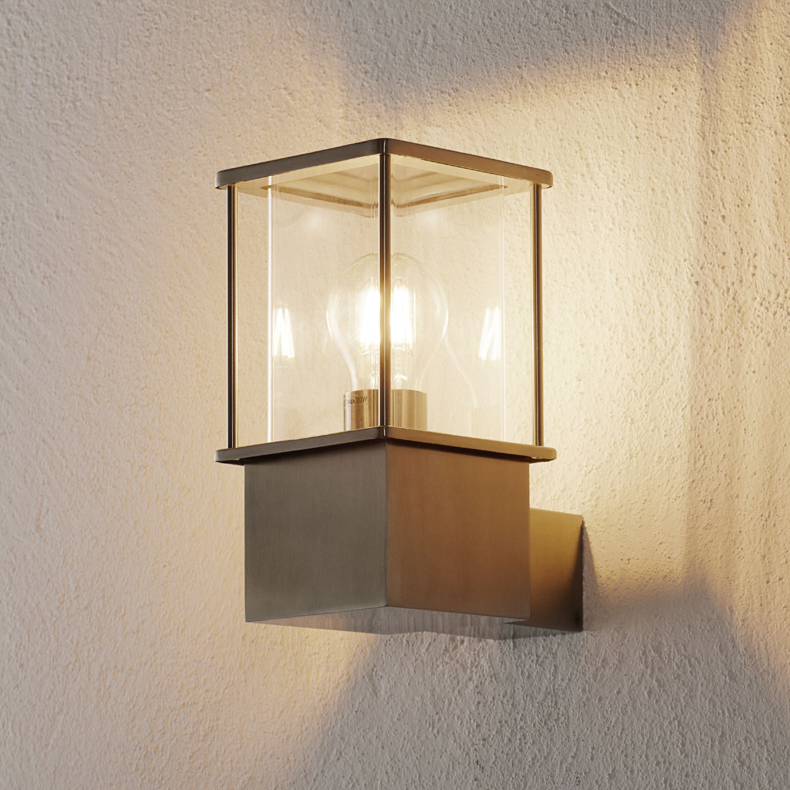 Lindby Stainless steel outdoor wall light Caspa, stainless steel, polycarbonate, E27, 20 W, energy efficiency: A++, W: 12.2 cm, H: 22.6 cm