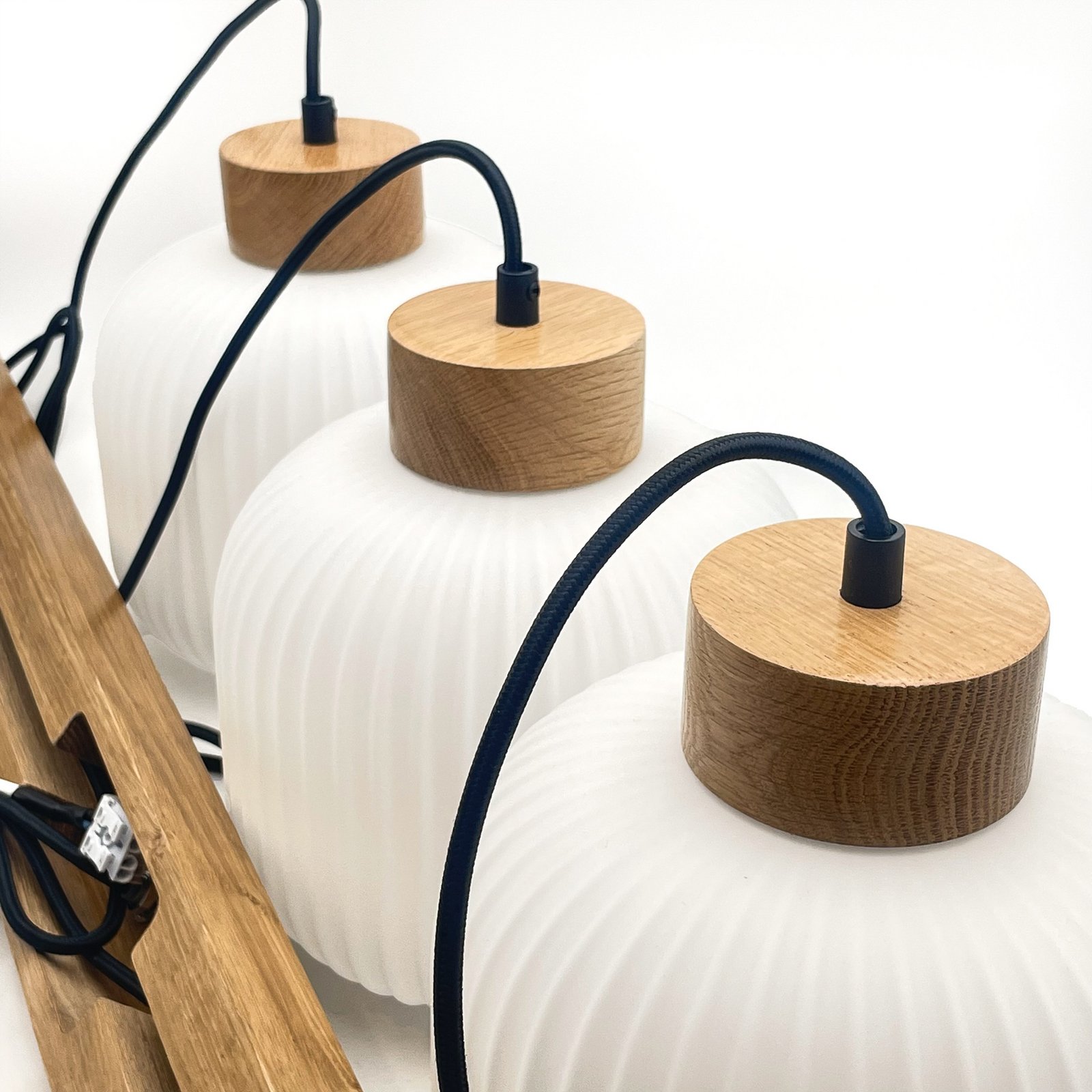 Harmony hanging light, length 110 cm, opal glass, oak, 3-bulb.