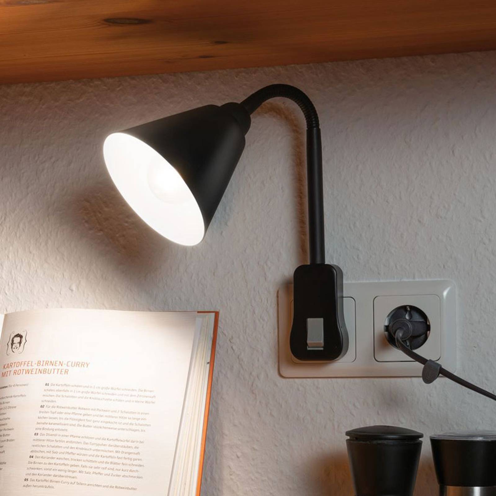 Paulmann Junus stickproppslampa med flexibel arm svart