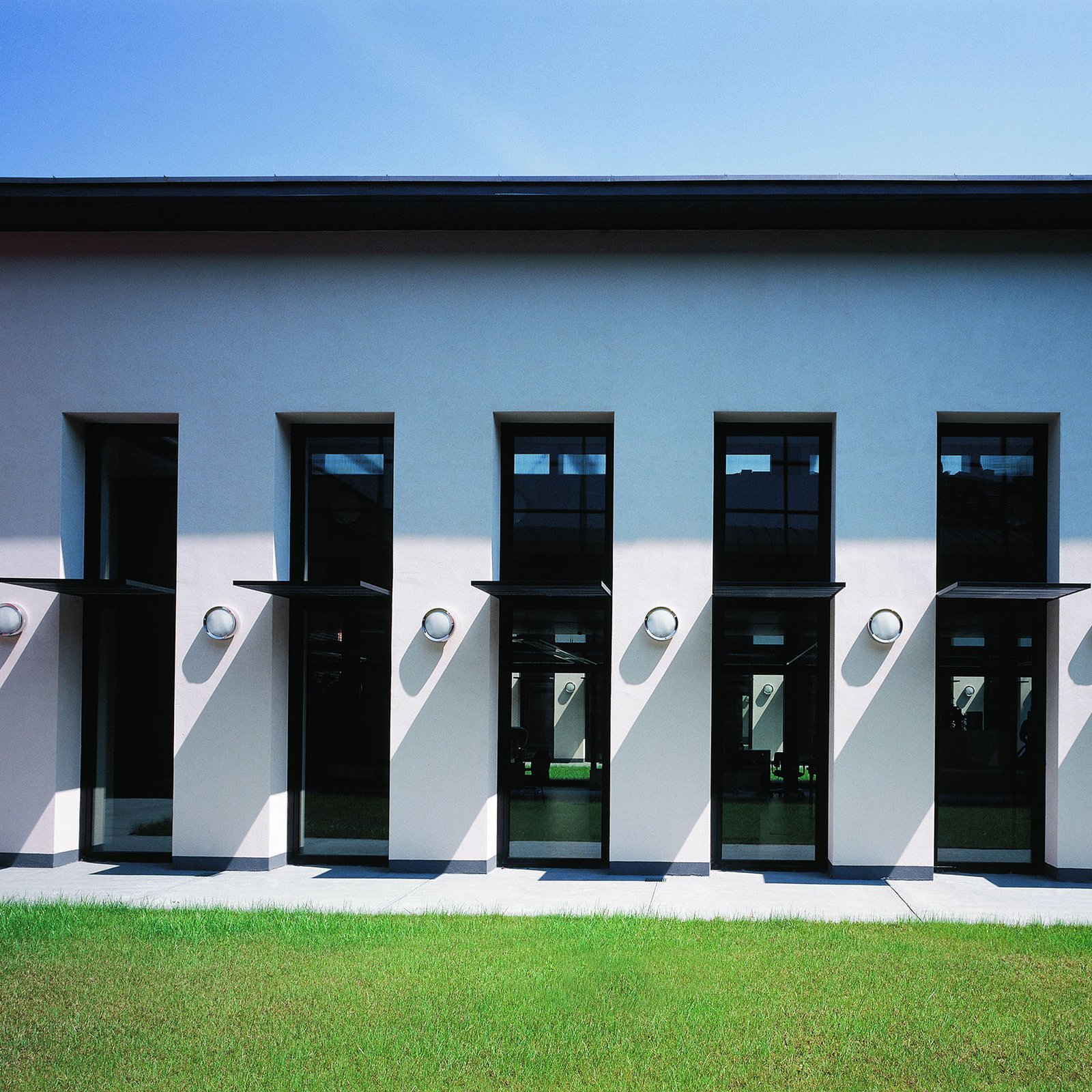Artemide Niki Edelstahl-Außenwandleuchte