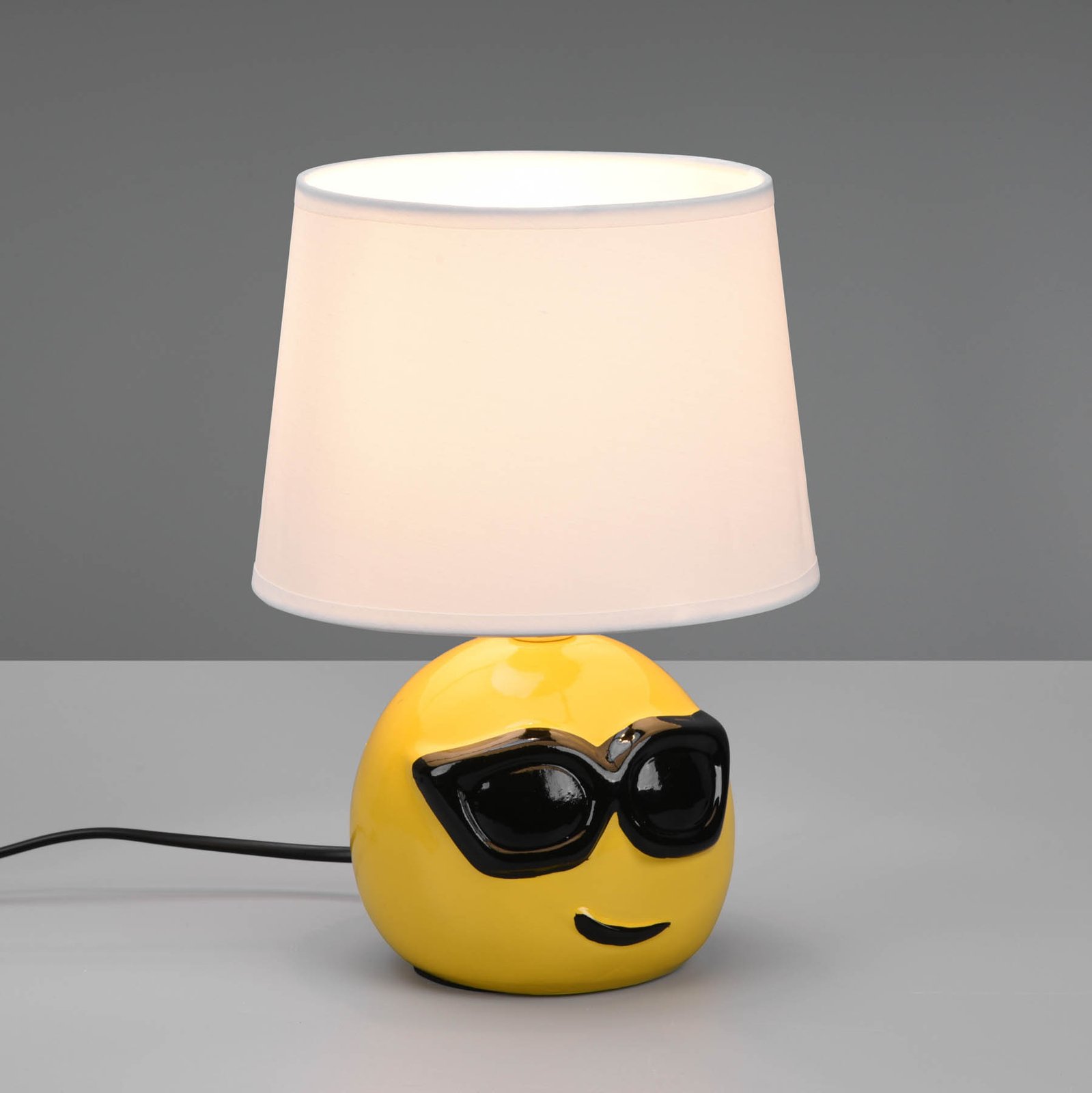 Lámpara de mesa Coolio con smiley, pantalla blanco