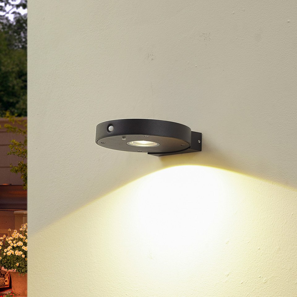 Lucande Tavon LED-solcellsvägglampa, svart från Lucande