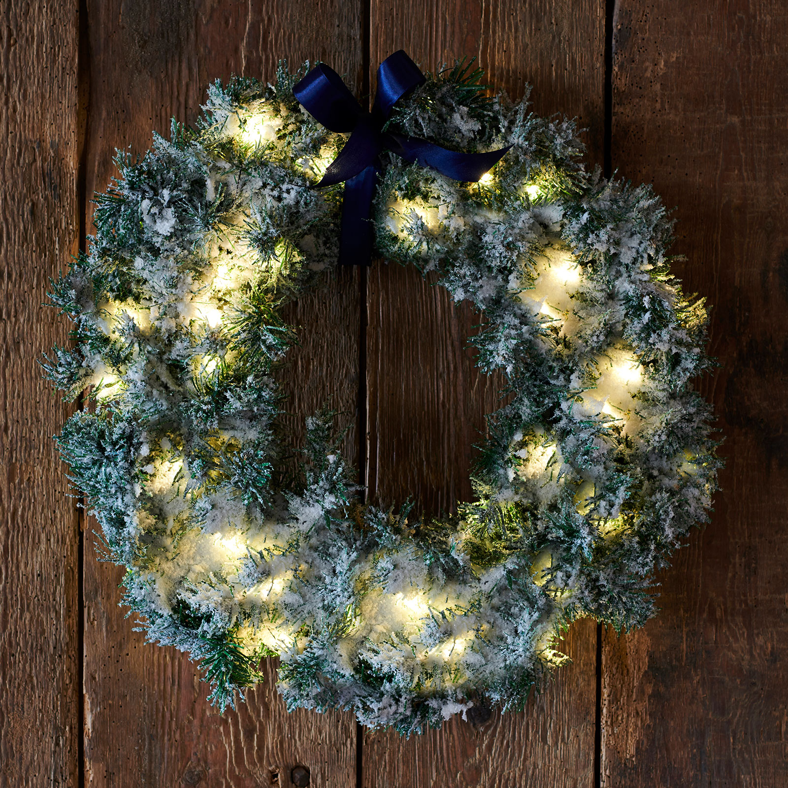 Anton LED wreath with Timer, green with snow decoration