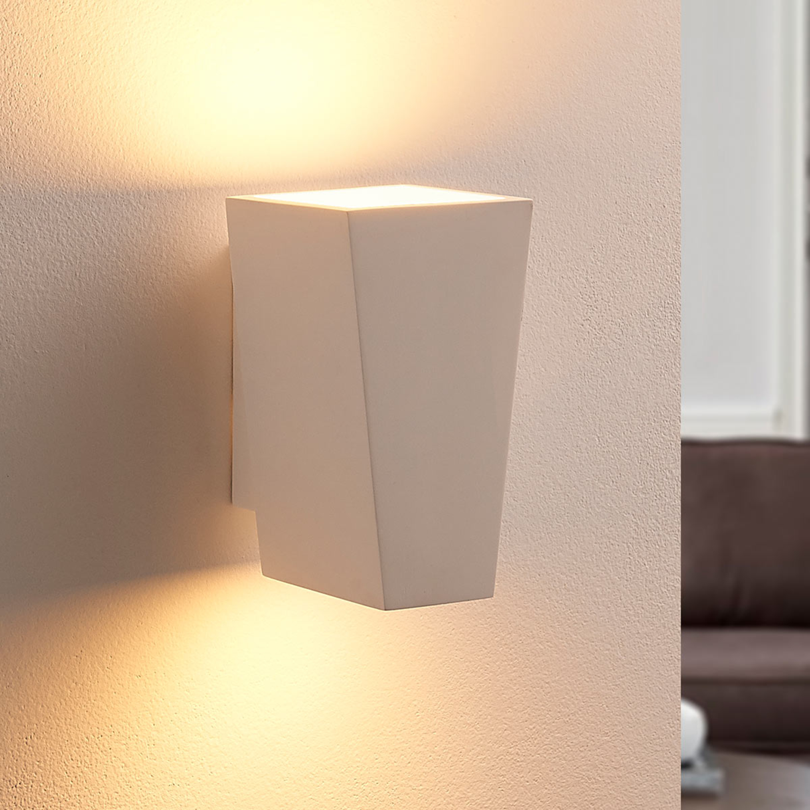 White LED wall lamp made of plaster