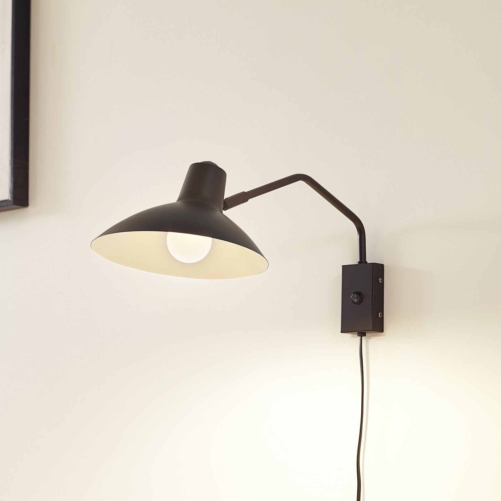 Lindby wall light Adrik, black, metal, with plug