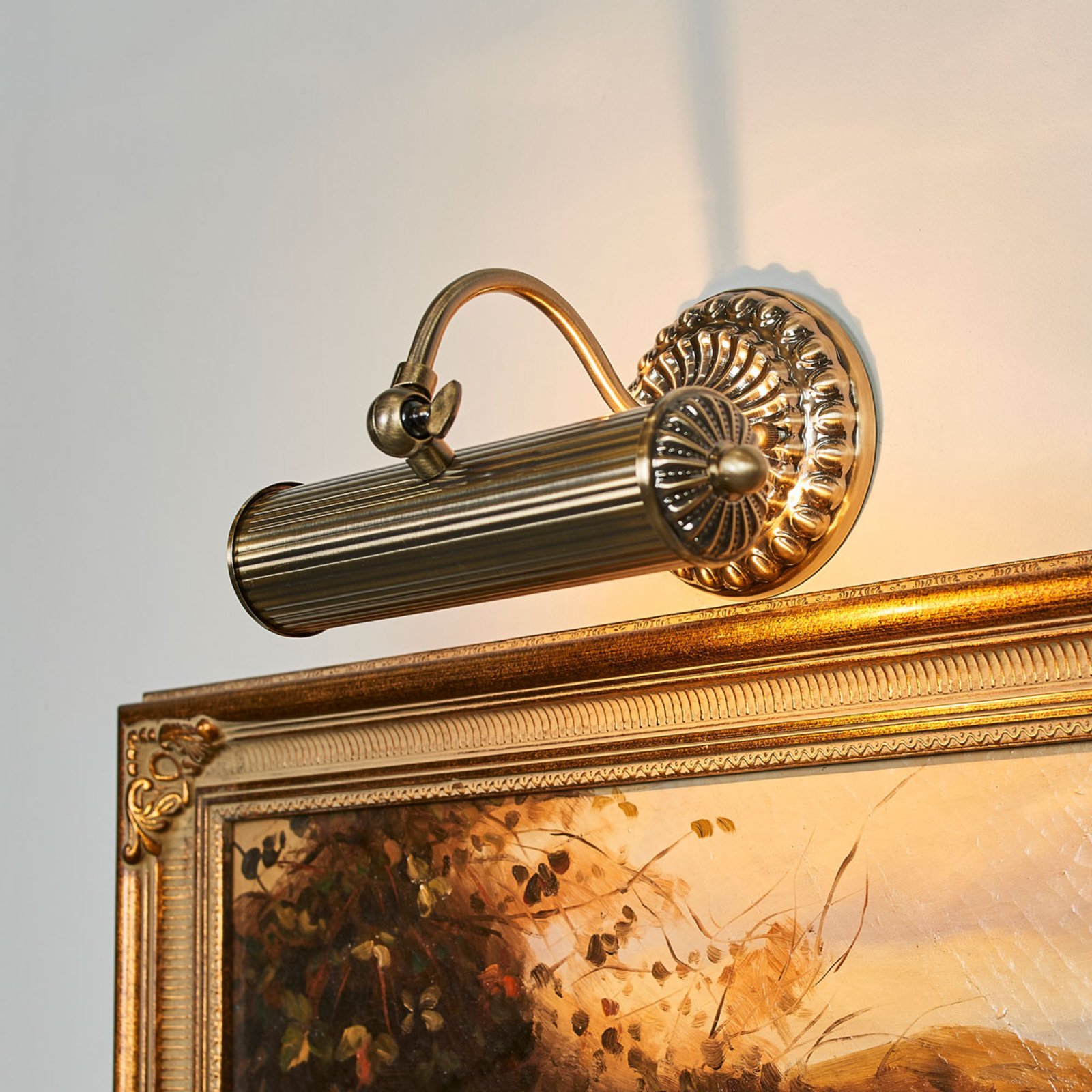 Antique-looking picture light Joely, antique brass | Lights.ie