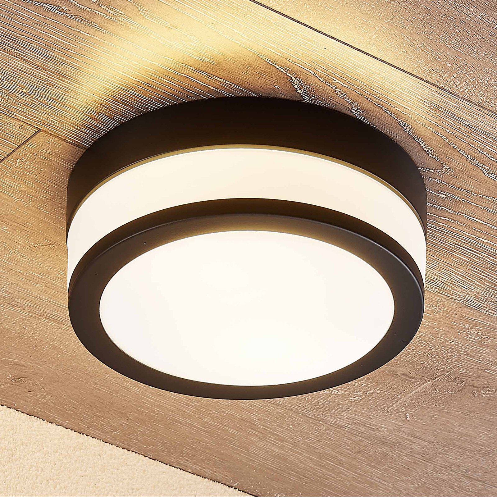 Lindby Flavi bathroom ceiling lamp, Ø 23 cm, black