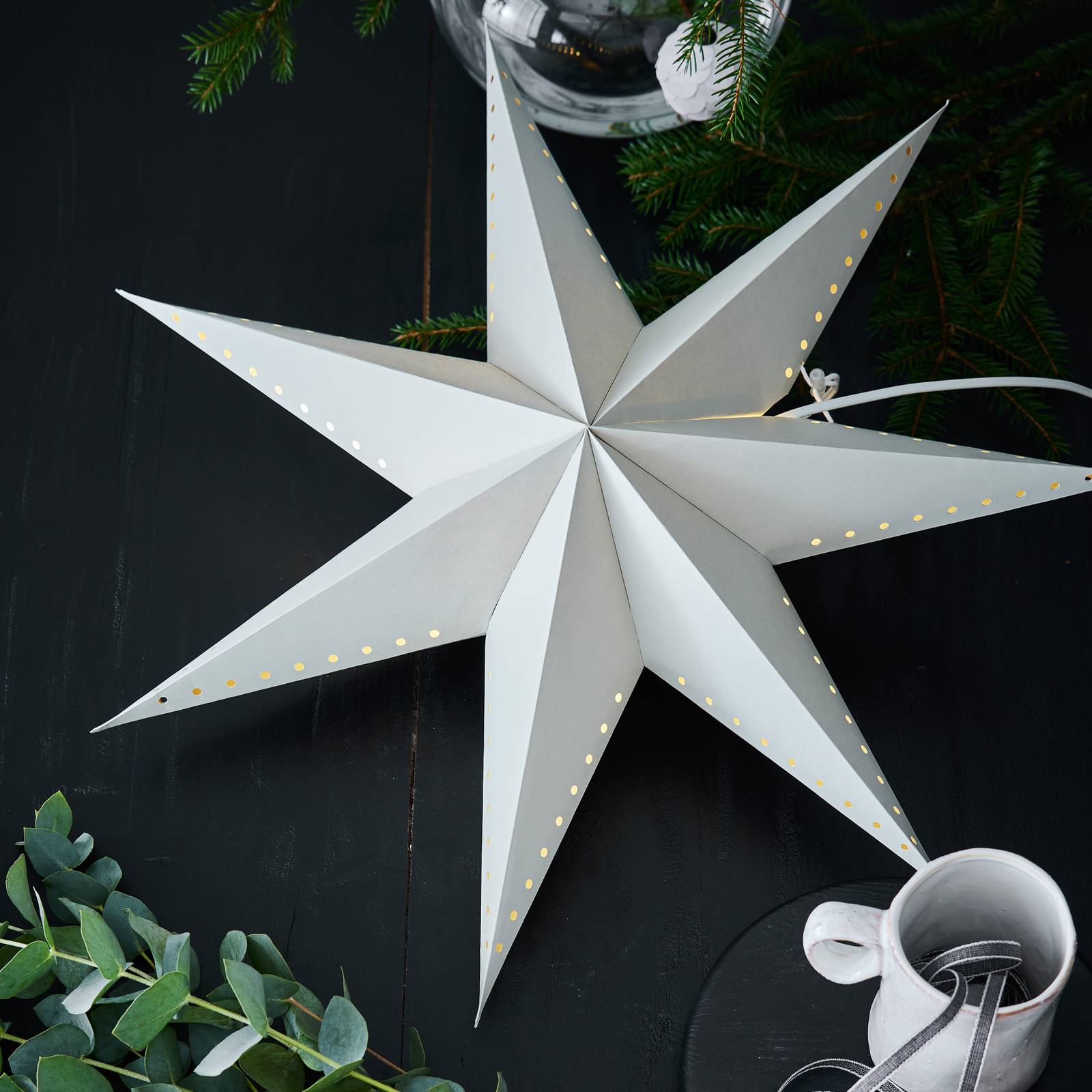 Livlig dekorativ stjerne opphengt grå Ø 60 cm