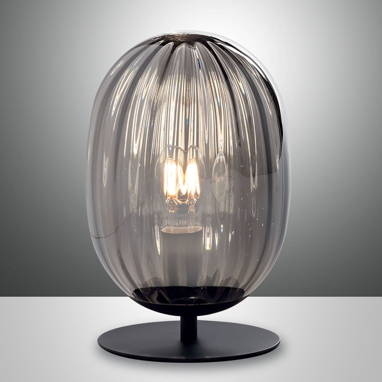 Ondergedompeld Carrière helpen Tafellamp Infinity met gedraaide glazen kap | Lampen24.nl