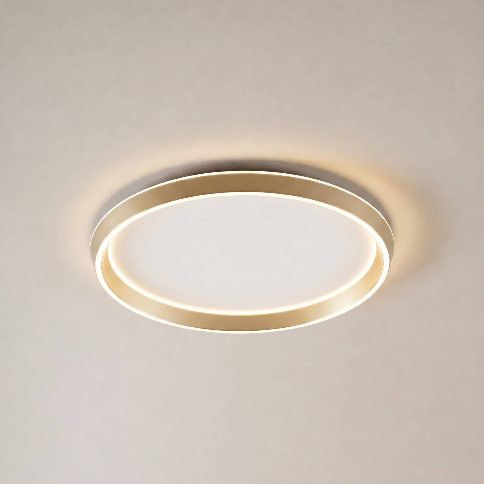 Lampa sufitowa LED Lucande Rylan, mosiężna, Ø 62 cm, ściemniana w zakresie