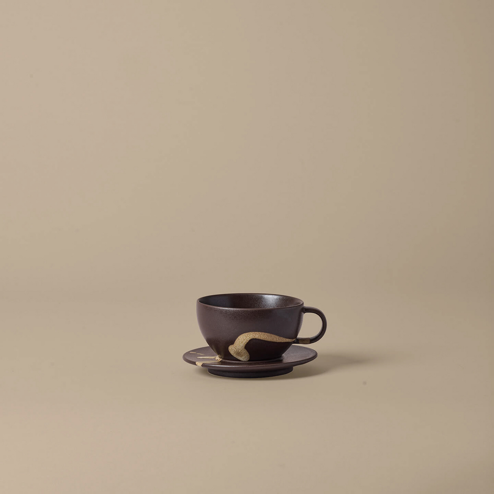Koyo cup with saucer, dark brown stoneware - ferm LIVING