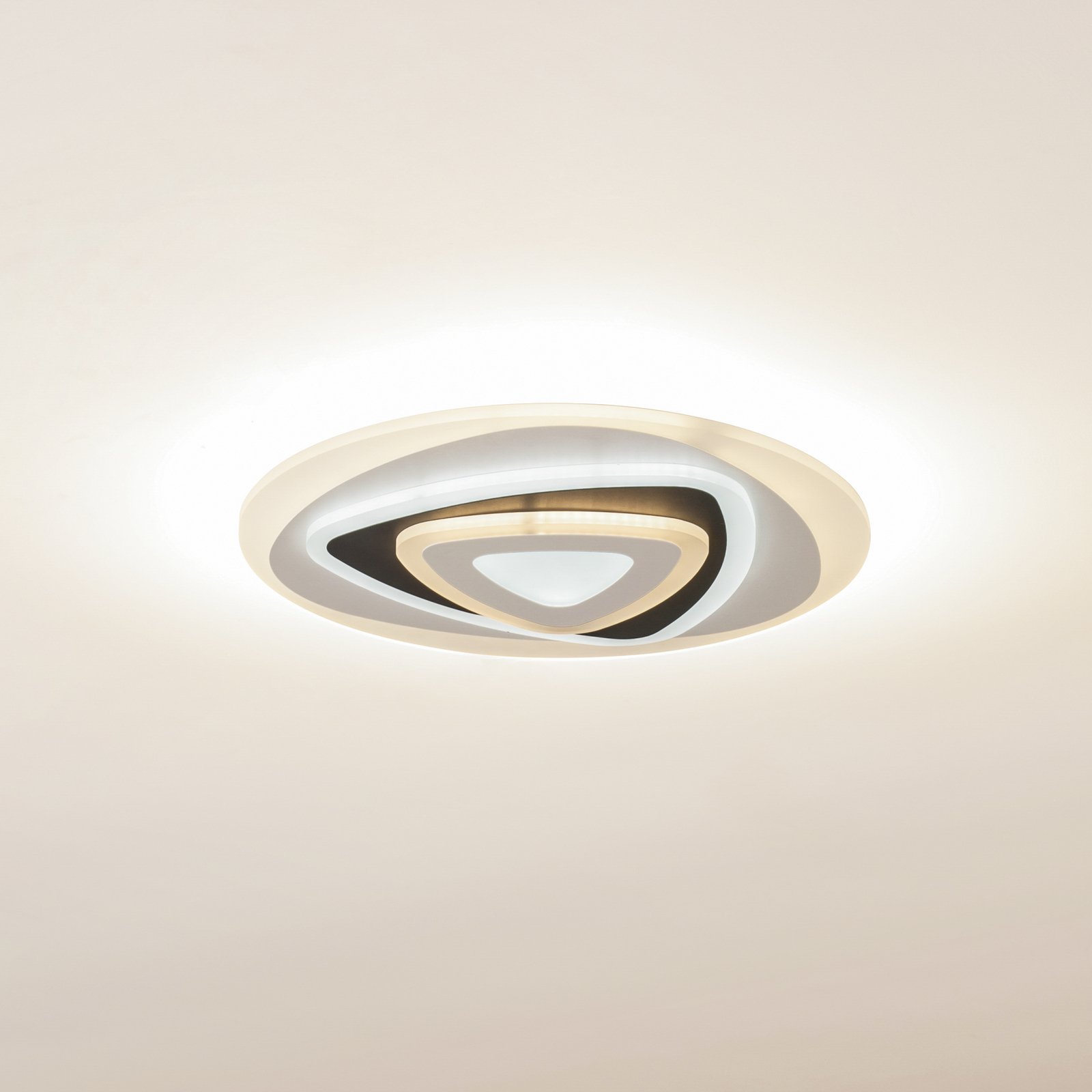 Lindby LED-taklampa Rebeka, oval, CCT, fjärrkontroll