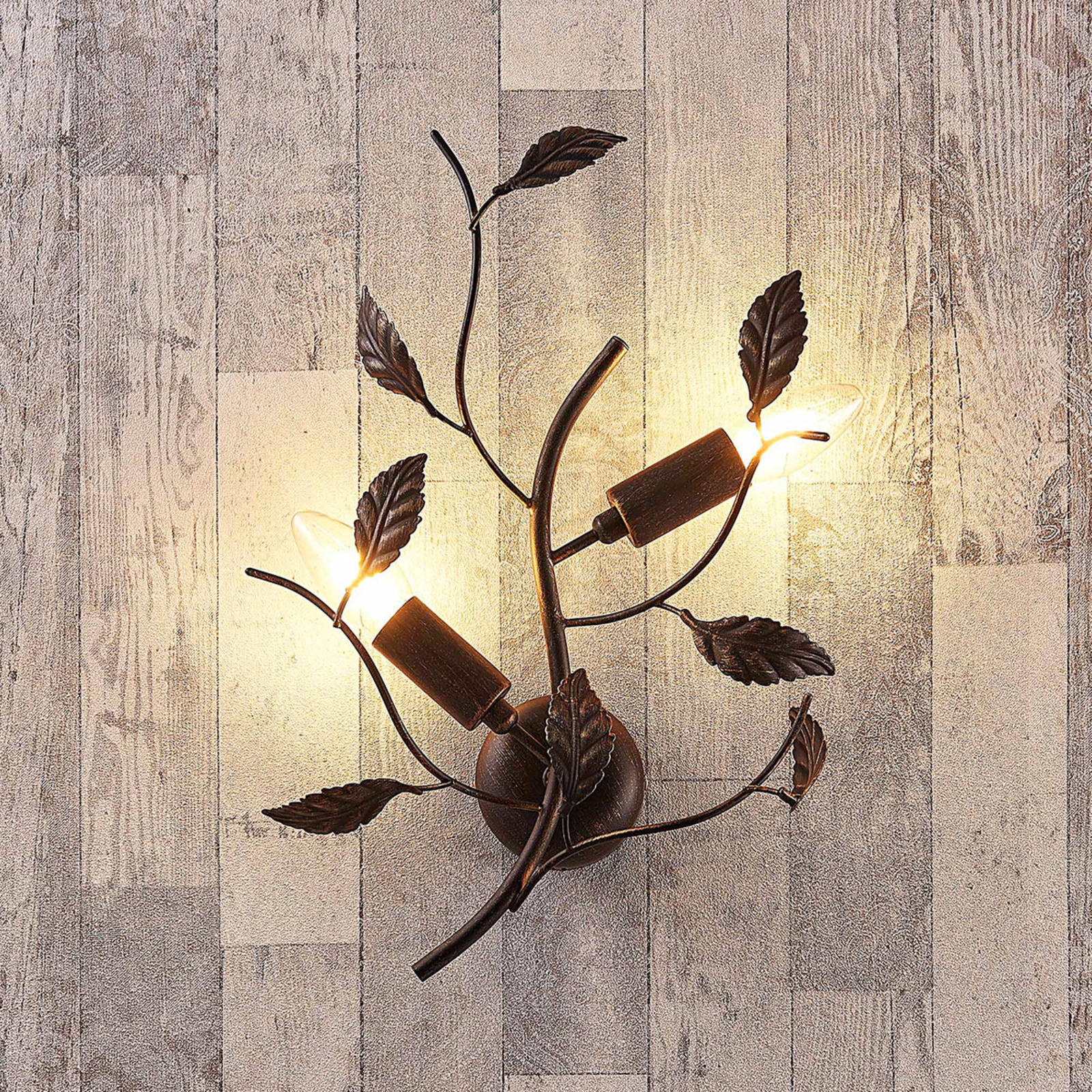 Applique Yos decorata con foglie in metallo