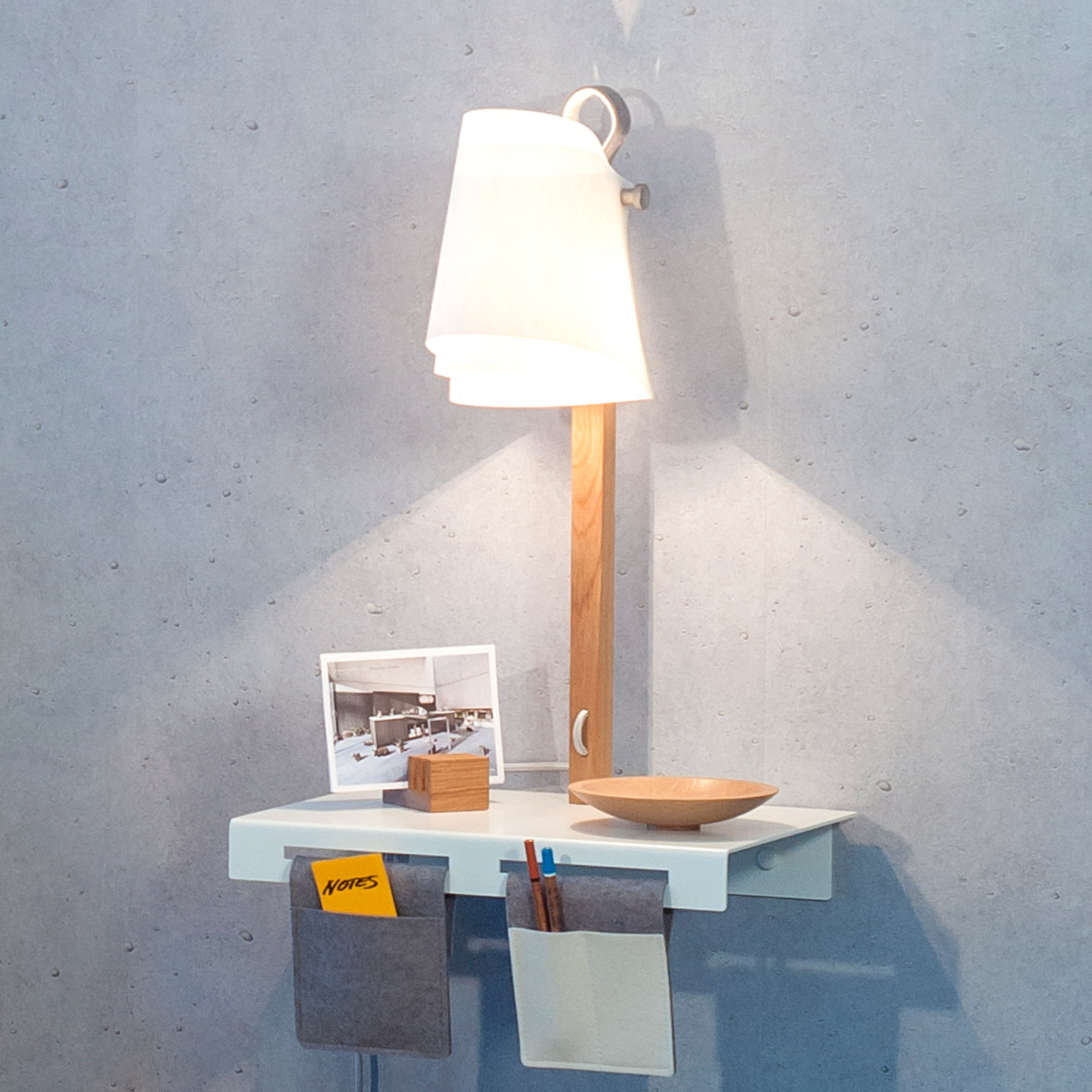 Fläks wall light with a shelf