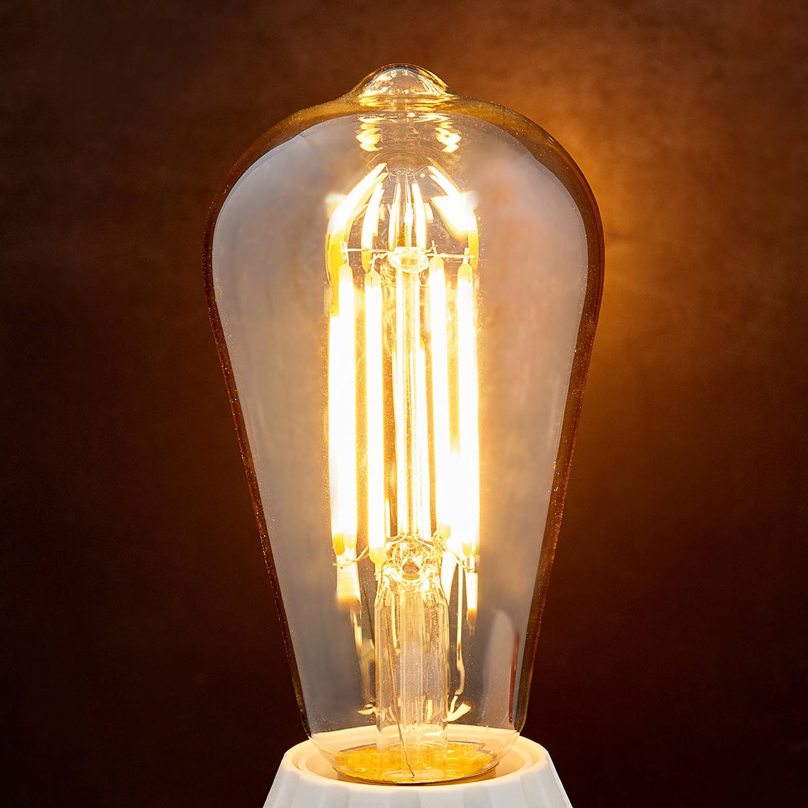 Lindby E27 LED rustikální lampa 6W 500 lm, jantarová 1 800 K