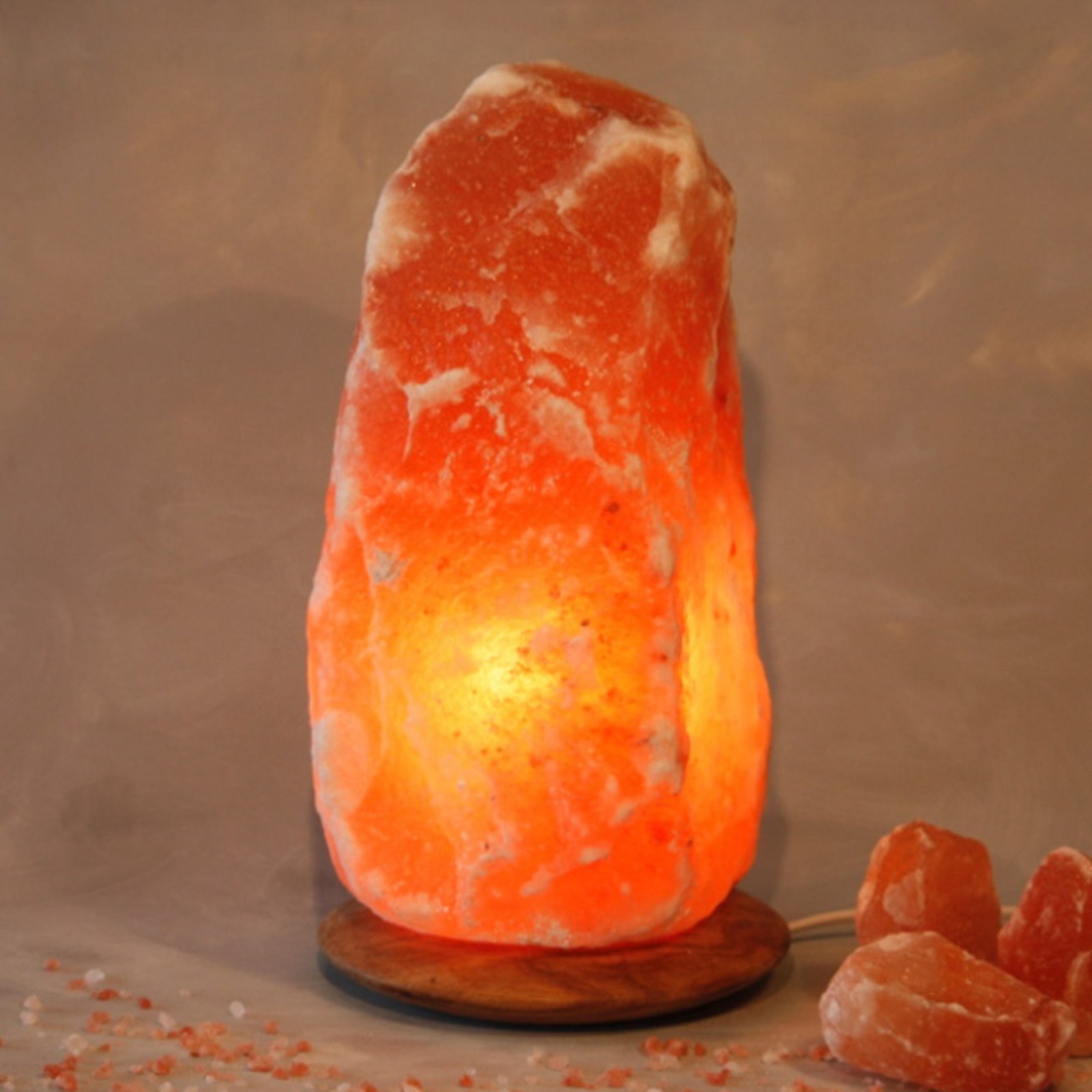 Rock lighted salt crystal with wooden base