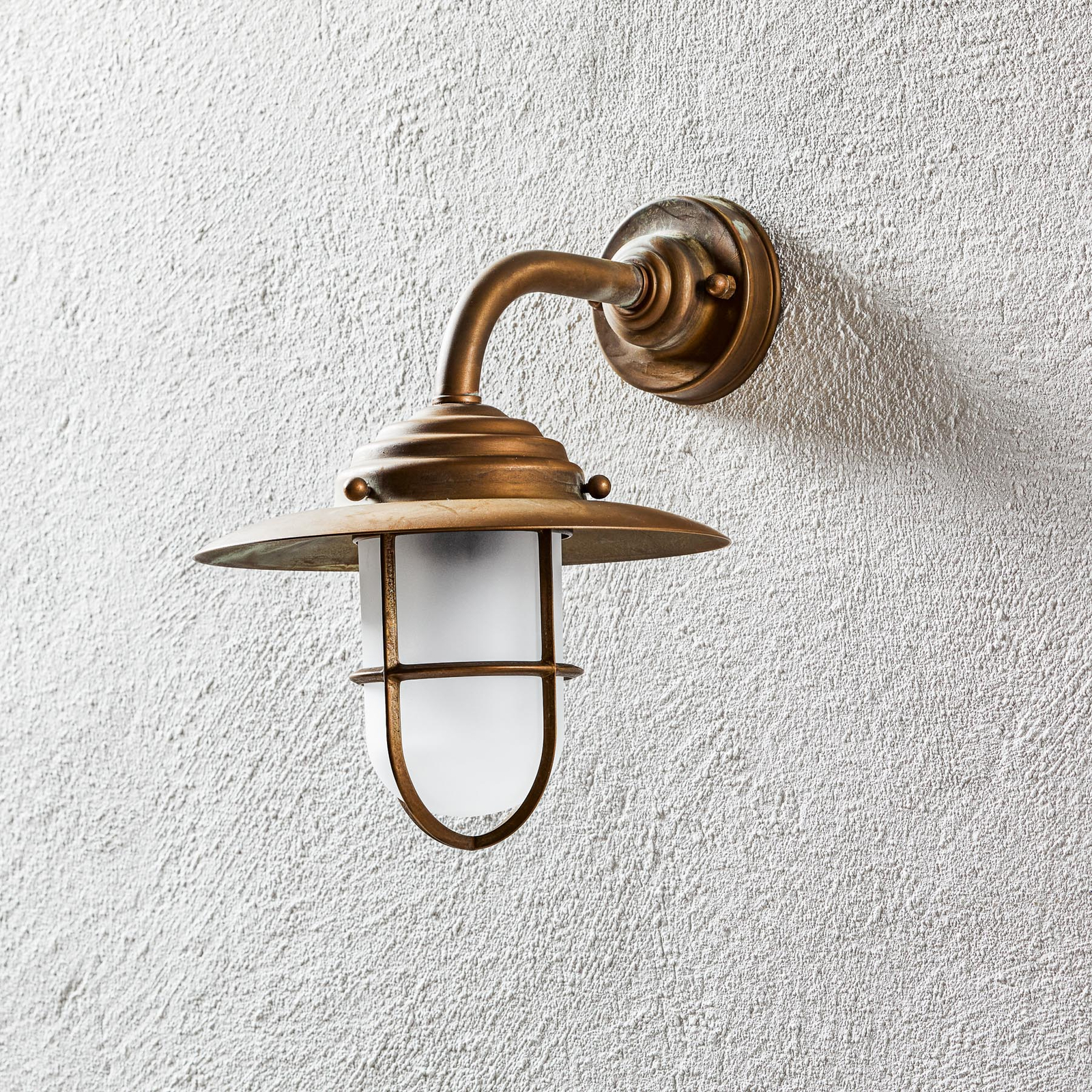 Antique outdoor wall light with grille, frosted glass