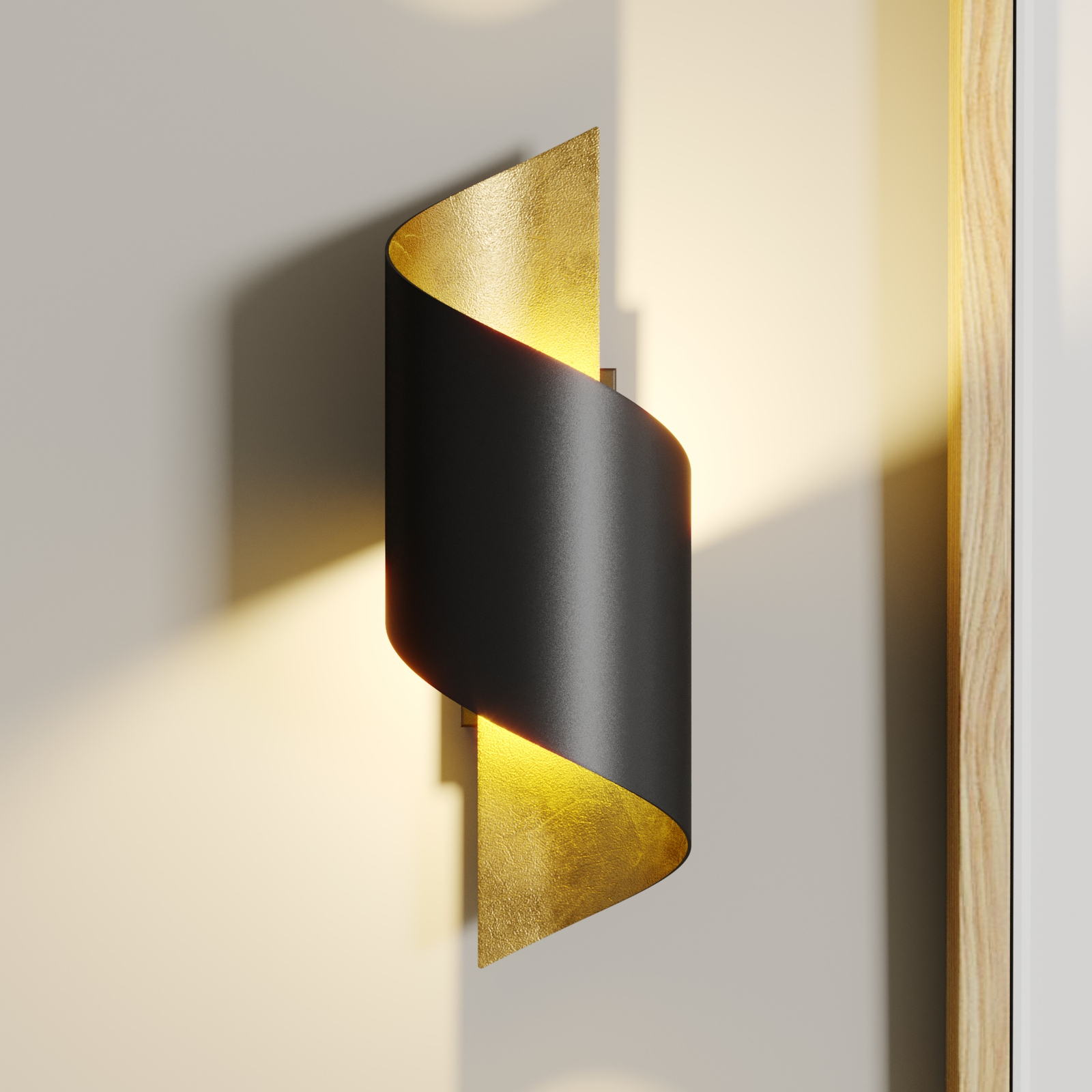 LED-vägglampa Desirio i metall, svart-guld