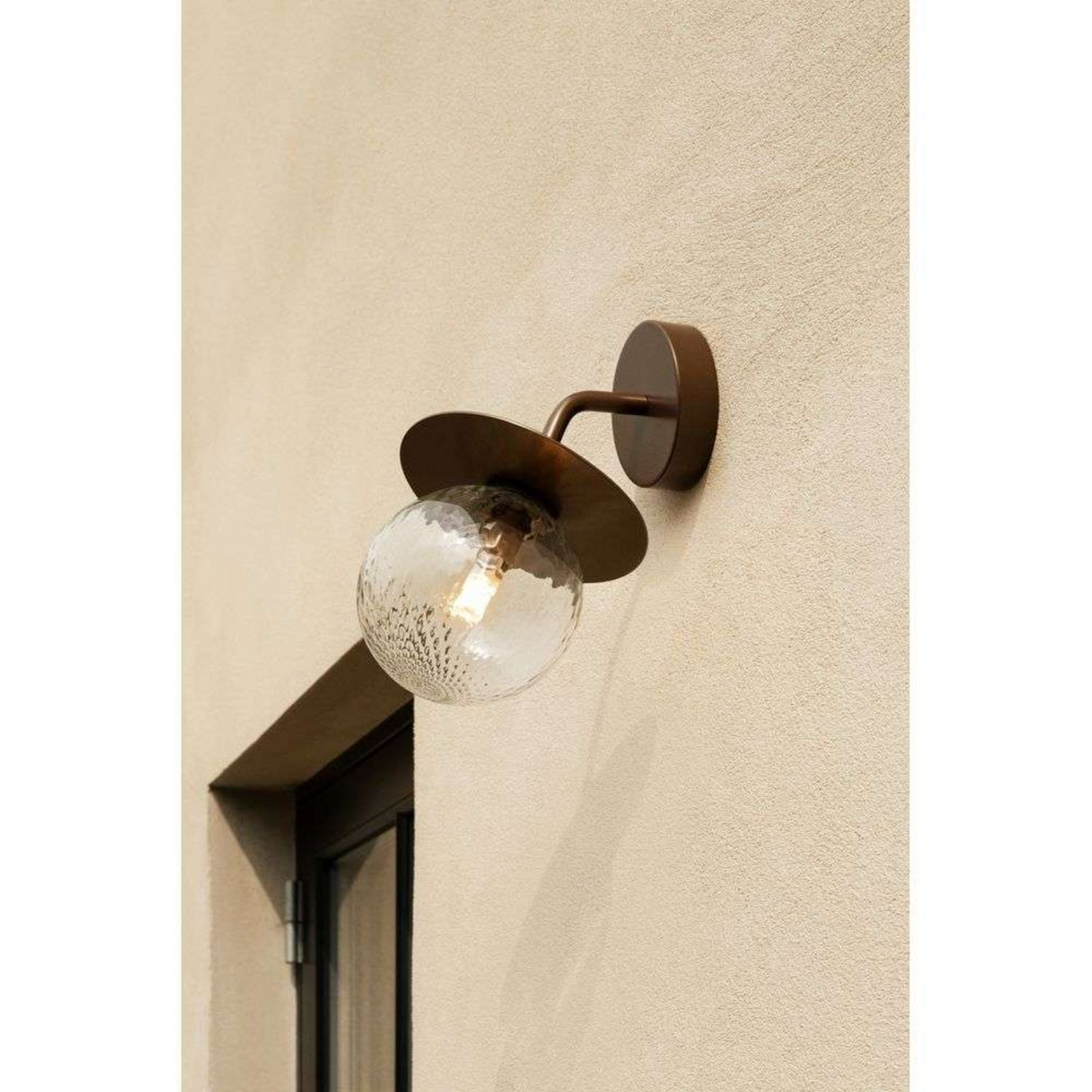 Nuura buitenwandlamp Liila, breedte 16 cm, brons/helder