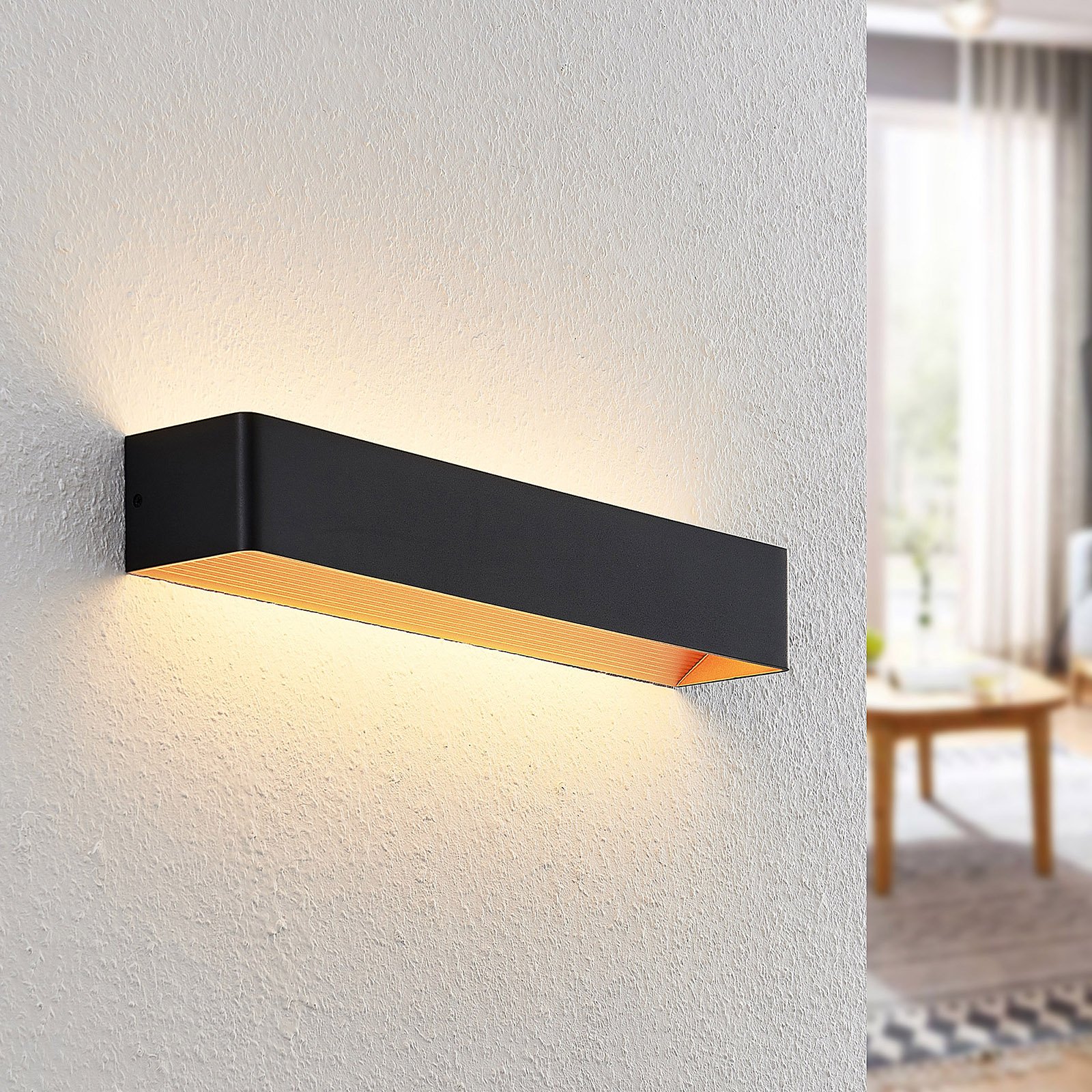 Arcchio Karam LED-vegglampe, 53 cm, svart