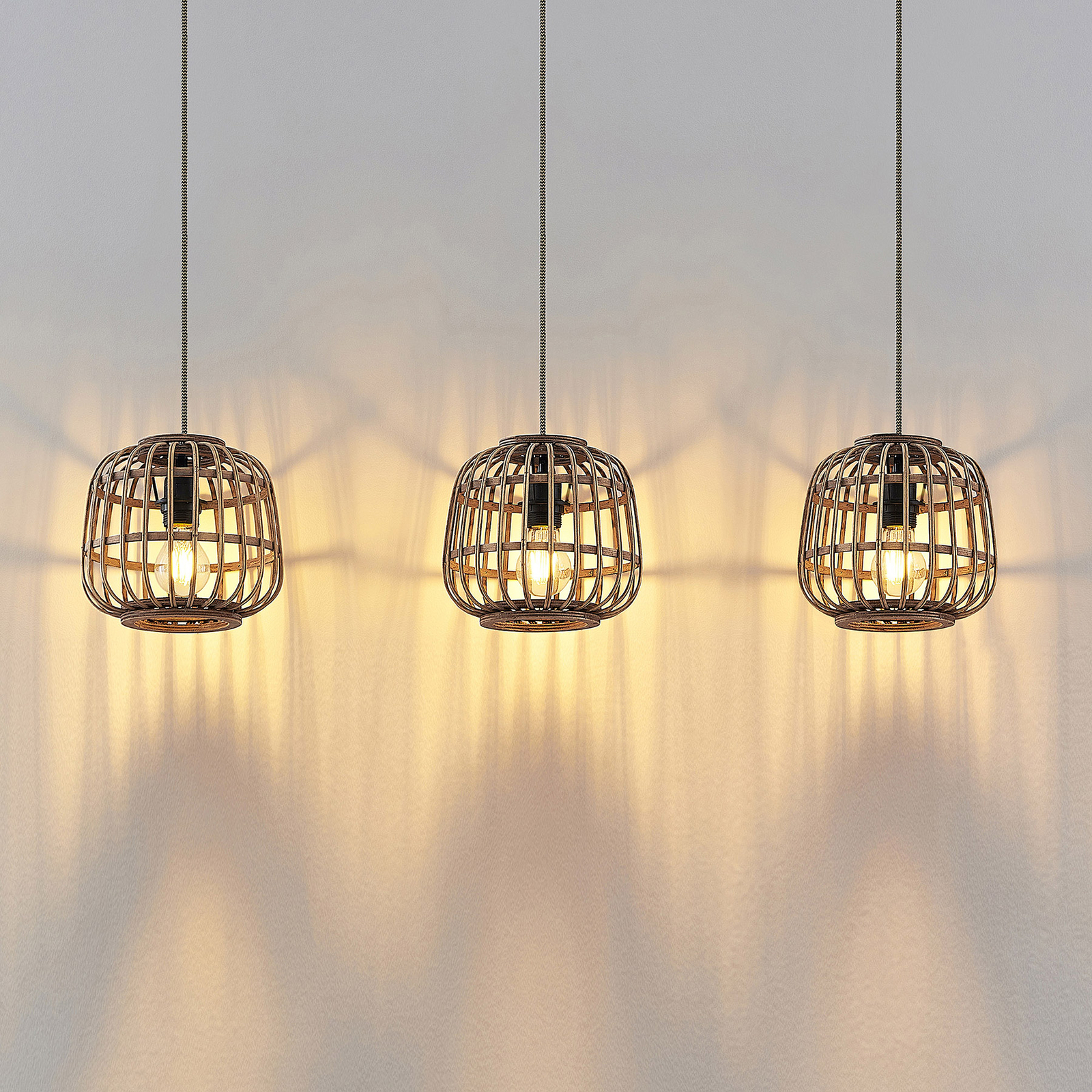 Lindby Bominio hanging light, rattan, three-bulb