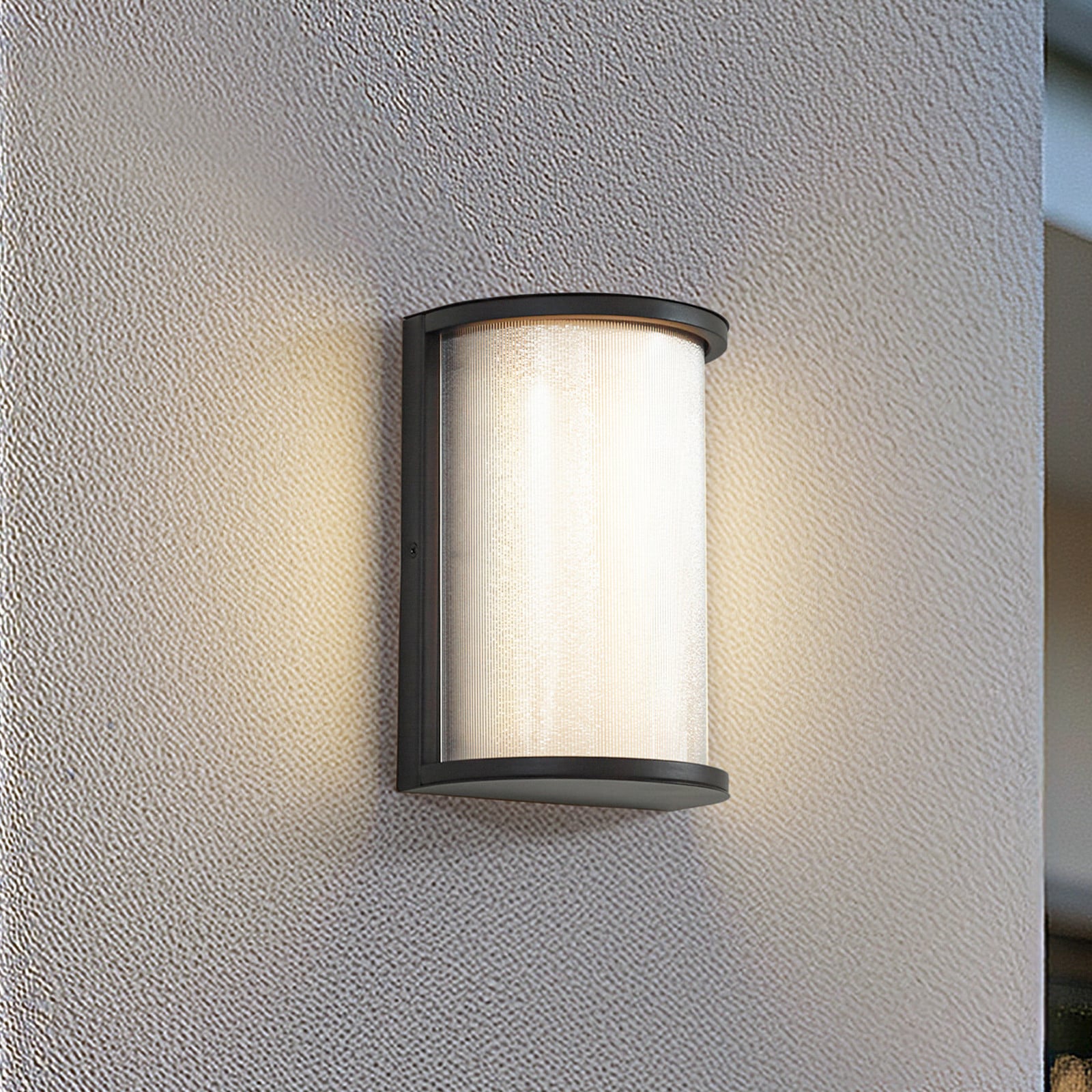 Calvik udendørs LED-væglampe, IP44, sort, 24 cm, riflet Lindby - Altan - Moderne - Metal - Med én lyskilde