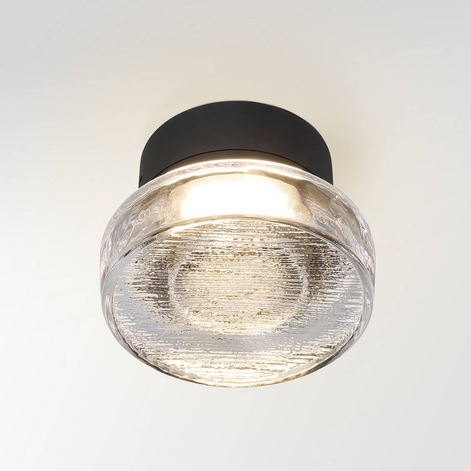 MARSET kinkiet zewnętrzny LED Roc, Ø 14 cm, czarna/przezroczysta