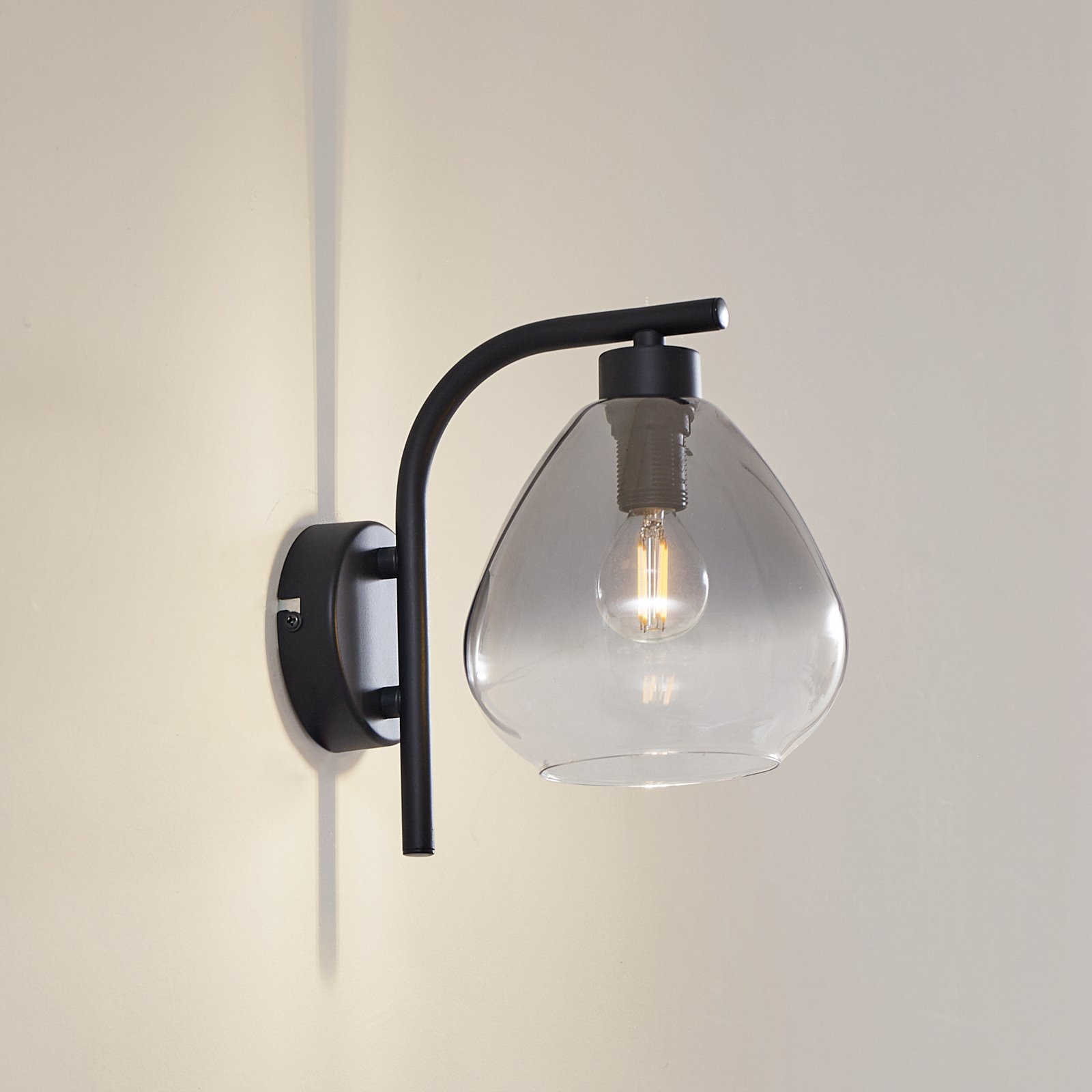 Lindby Pendura wall light, Ø 15 cm, black, glass