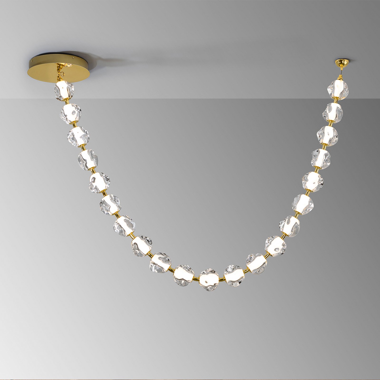 Zaria LED pendant light, 21-fl., gold, clear, metal, acrylic