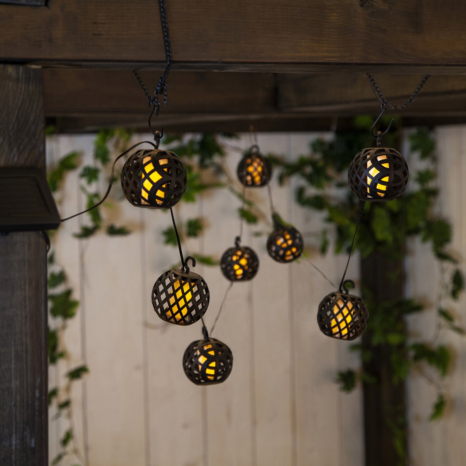Flame LED solar string lights with a flame effect