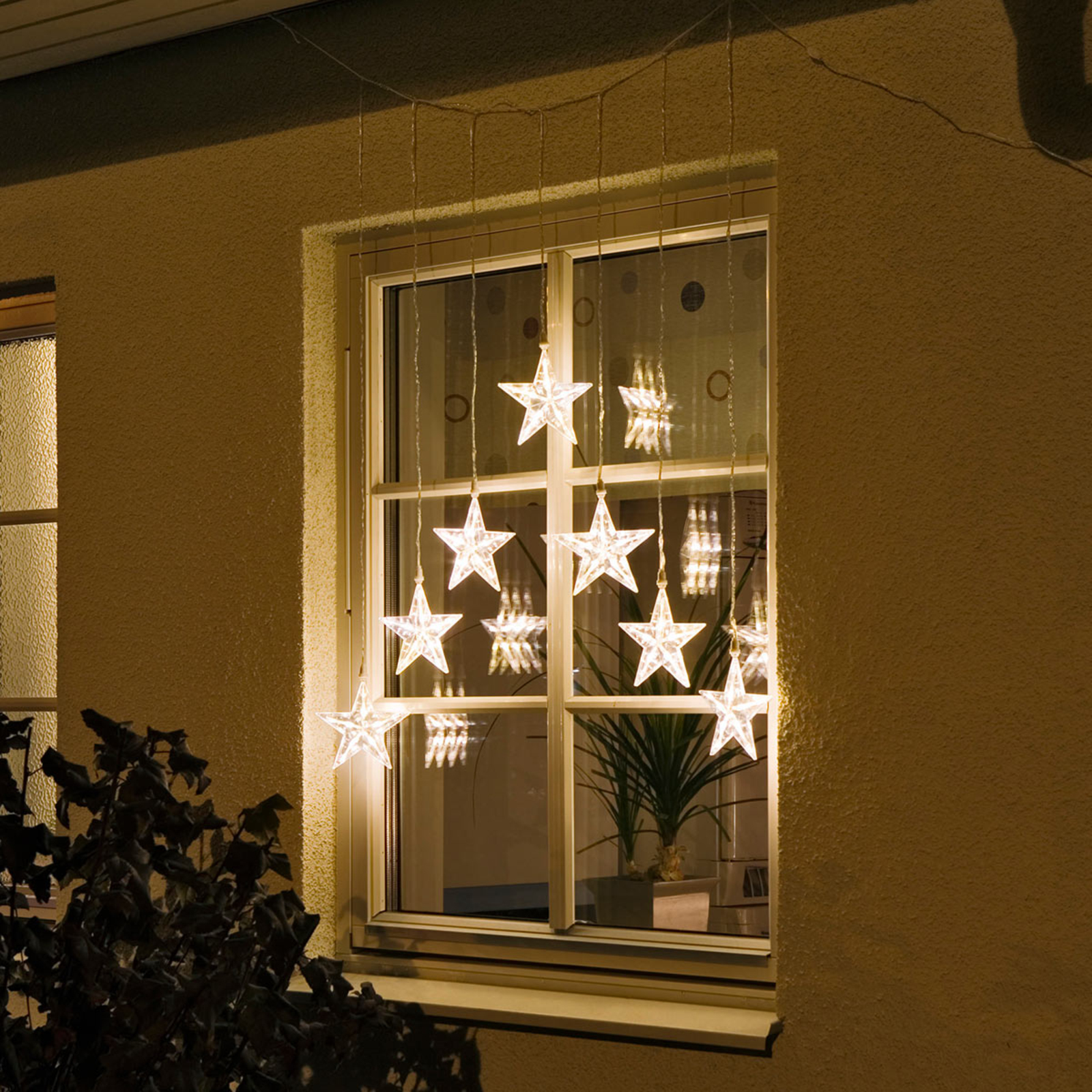 Lichtervorhang LED mit 7 Sternen, warmweiß