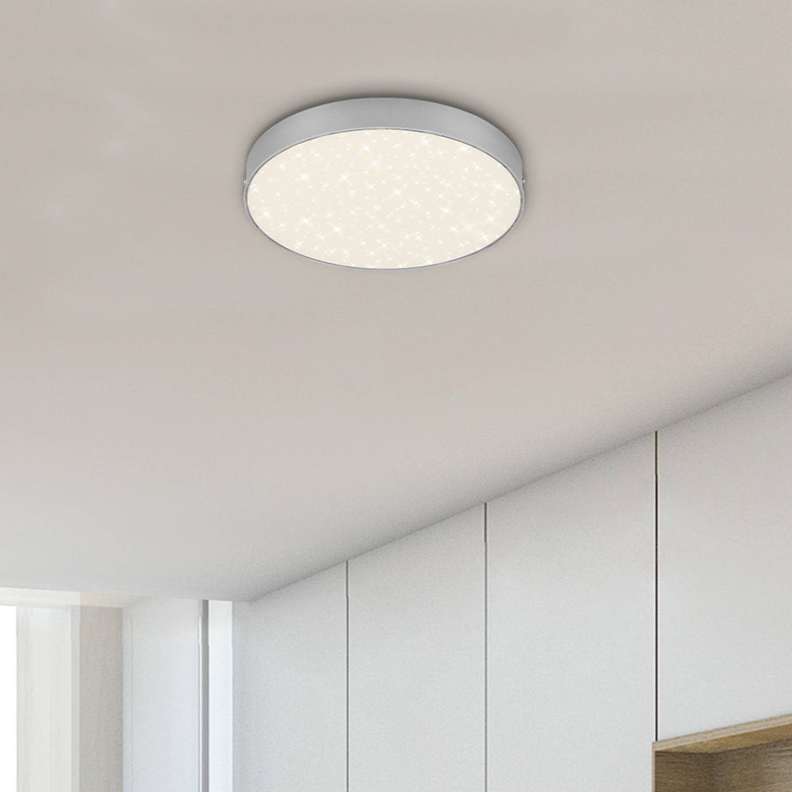 Lampa sufitowa LED Flame Star, Ø 21,2 cm, srebrna