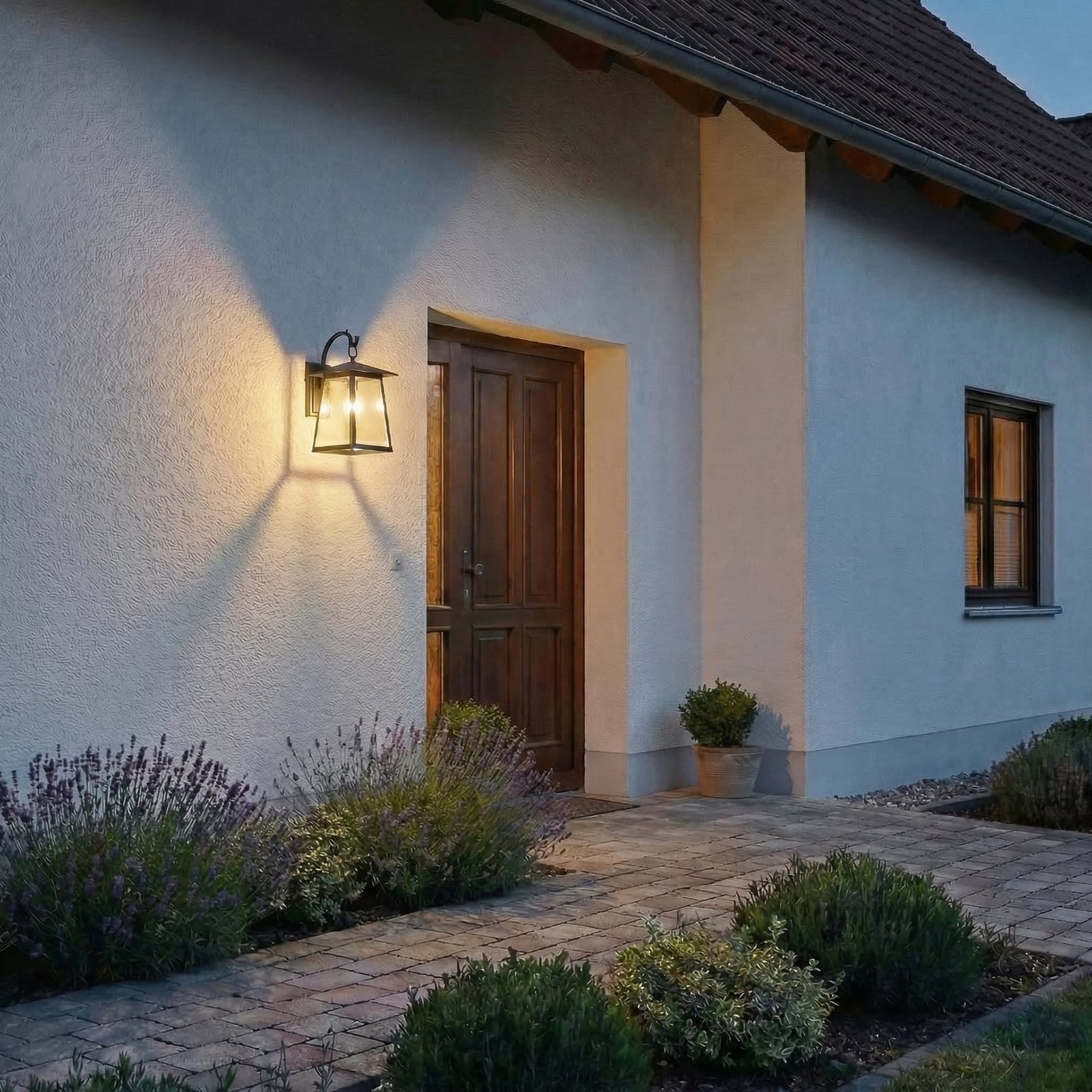 Xavon Vonkajšie nástenné svietidlo, E27, čierne, IP44, lucerna - Lucande