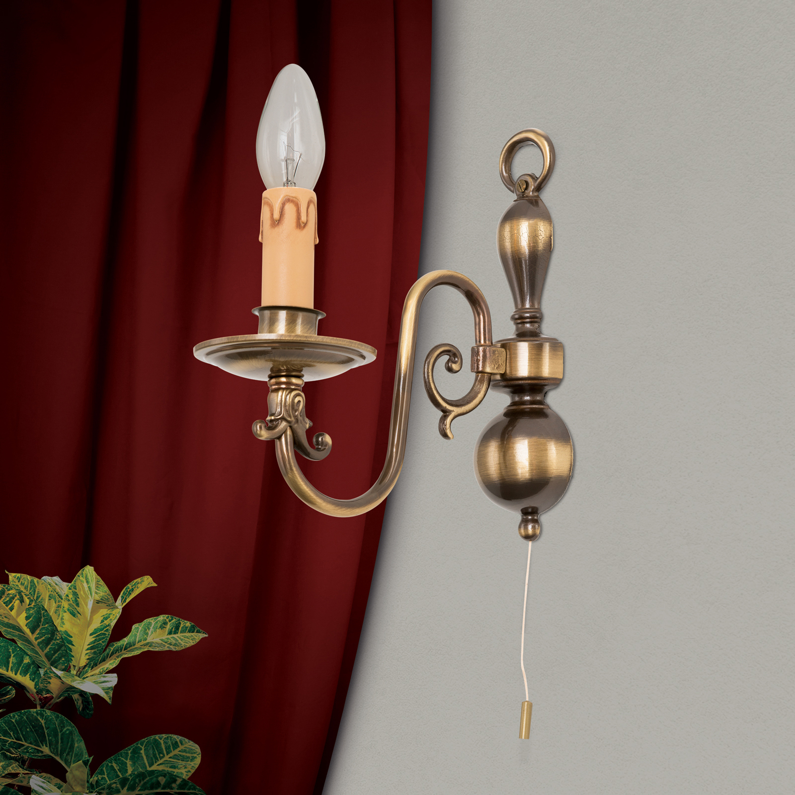 Imke 1-bulb wall light, antique brass dark patina