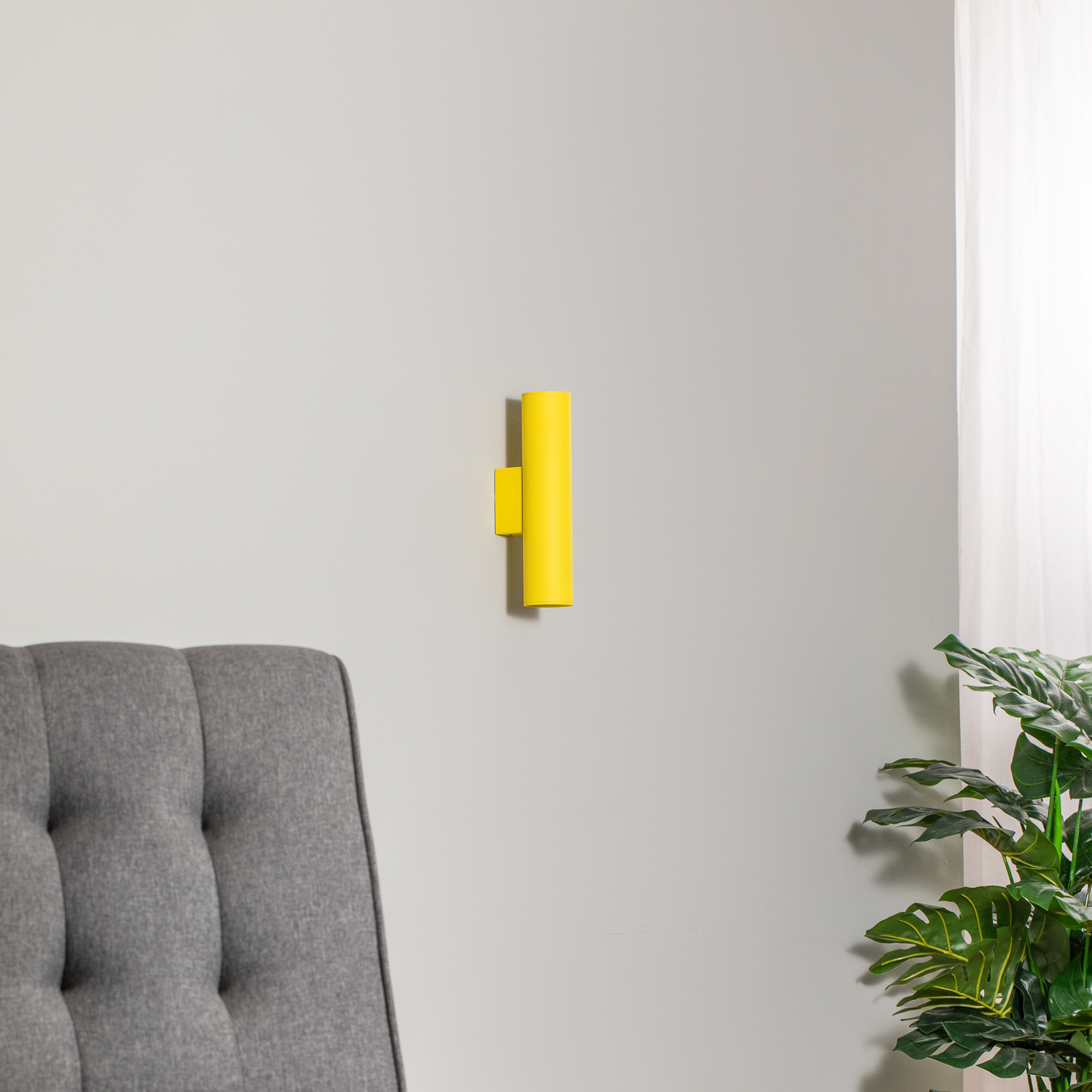 Cerro wall light, yellow, steel, Ø 6 cm, up/down