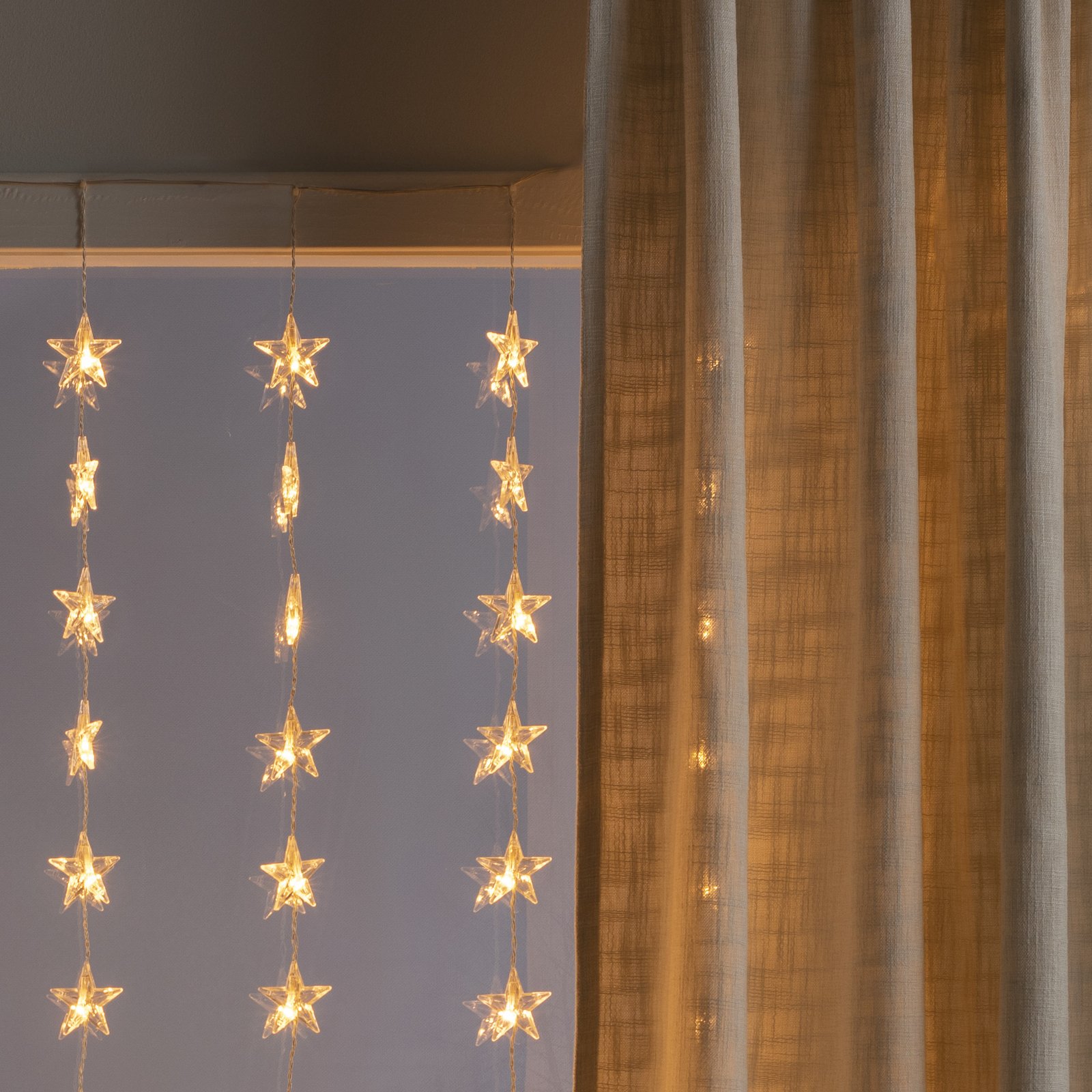 LED-valoverho Tähdet 120 lamppua, meripihka