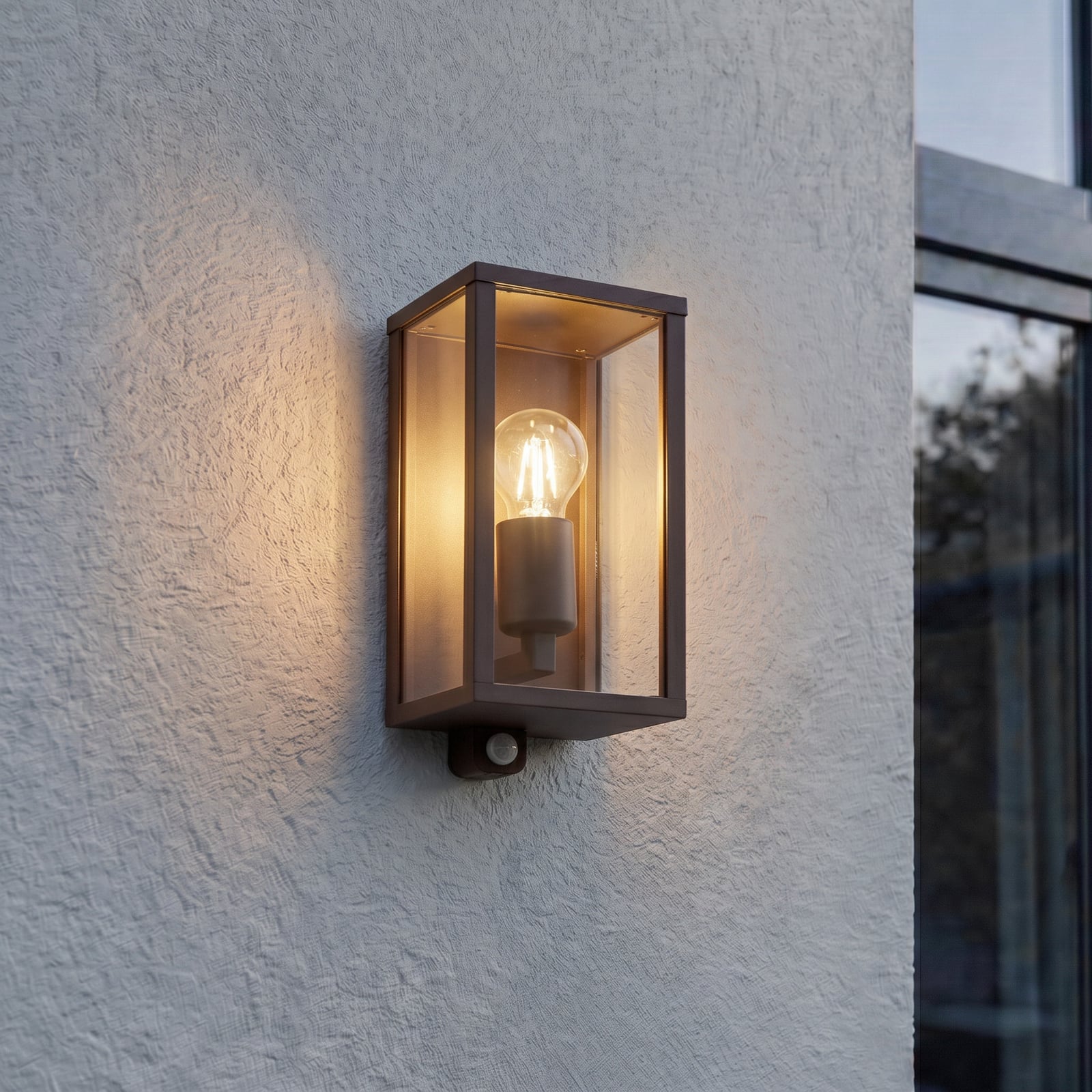 Lindby utomhusvägglampa Peldar, rostfärgad/klar, 26 cm, sensor Lindby utomhusvägglampa Peldar, rostfärgad/klar, 26 cm, sensor