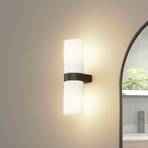 Lucande Basolo bathroom wall light, black, height 31.5 cm, glass