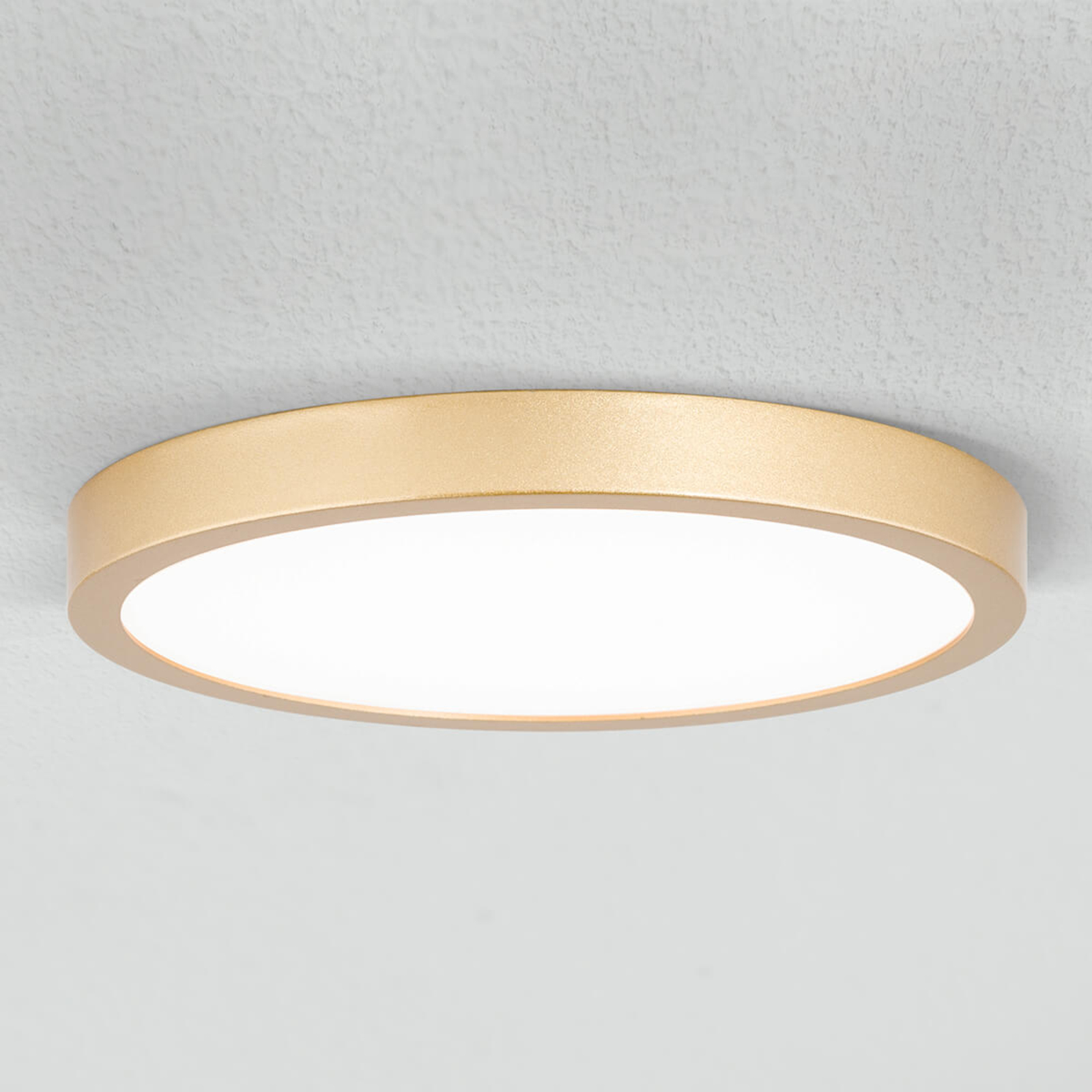 Vika LED ceiling light, round, matt gold, Ø 23 cm