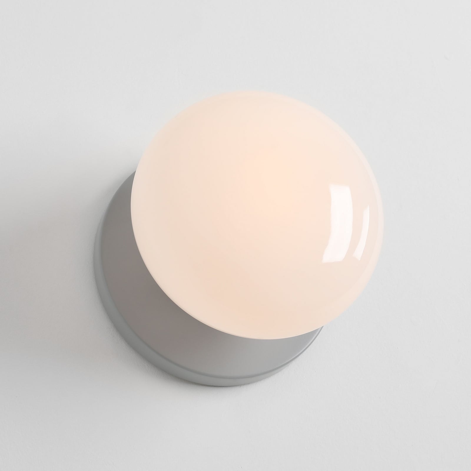 Zidna svjetiljka Flo, siva, Ø 19 cm, staklo - Aldex