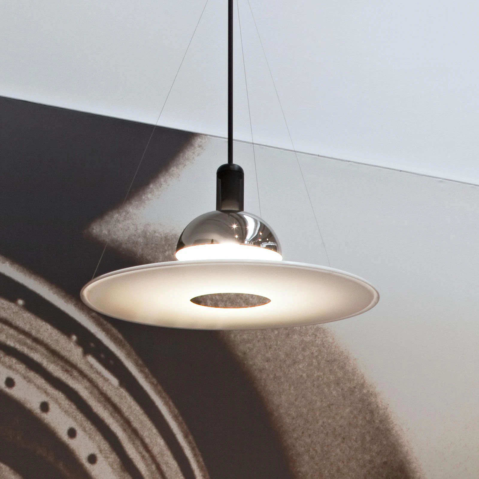 FLOS Frisbi - Pendant light with white disc | Lights.co.uk